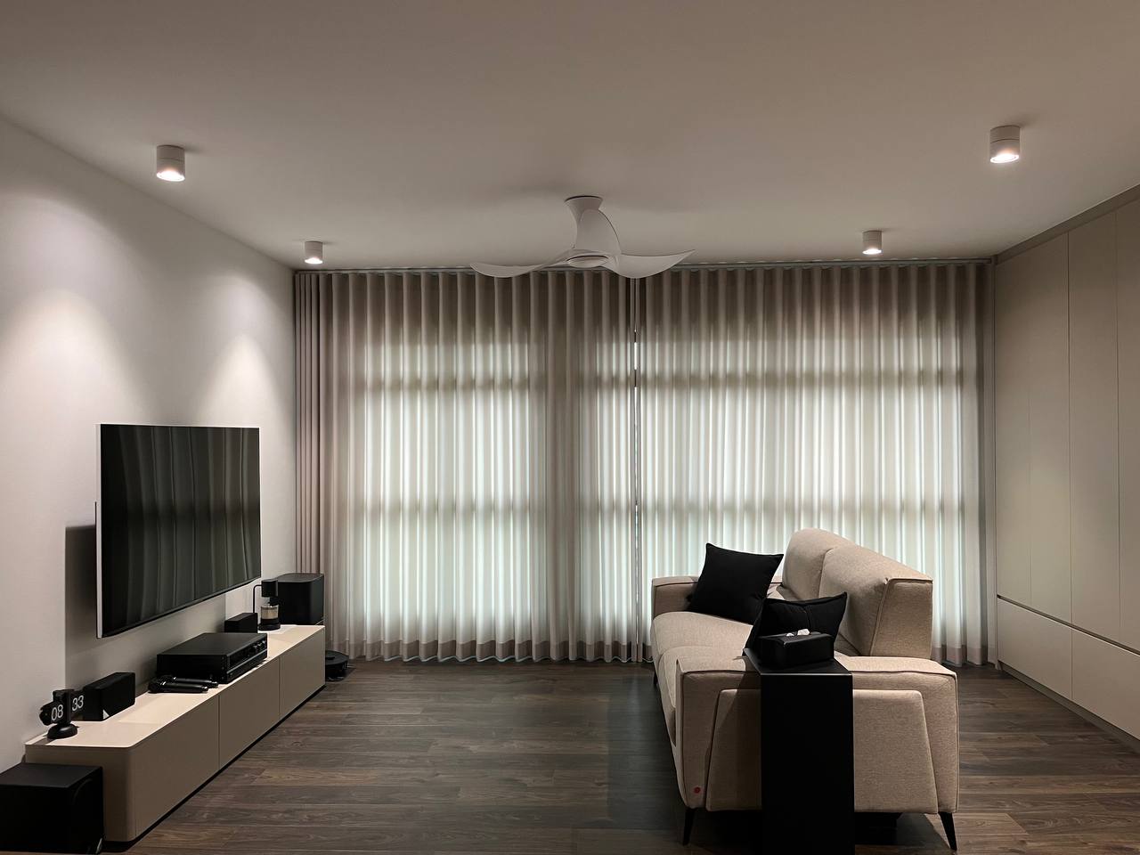 Modern Minimalist 5 Room BTO - Modern minimalist living room, sleek entertainment center, large flat-screen TV, neutral color