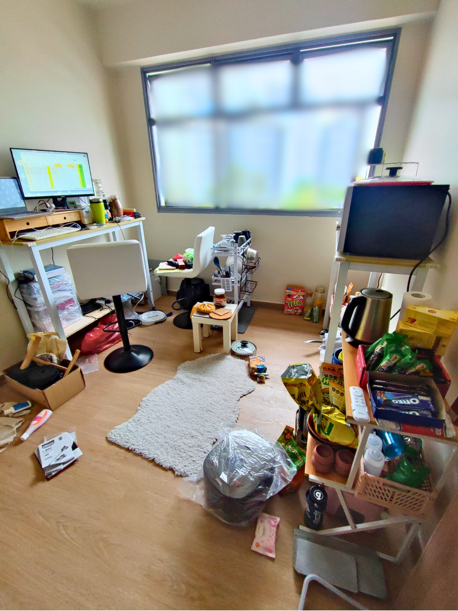 The Evolution Of My Home Gym From A Makeshift Kitchen - desk and chair, cluttered room, computer setup, monitor, laptop