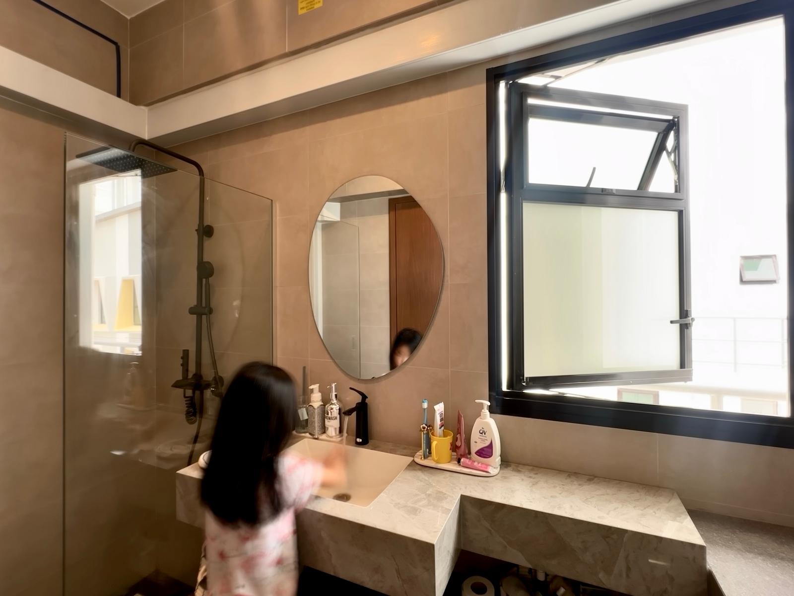 House Tour: Minimalist Home Reno for S$37K | Tampines - Modern bathroom, child playing, vanity area, round mirror, tiled