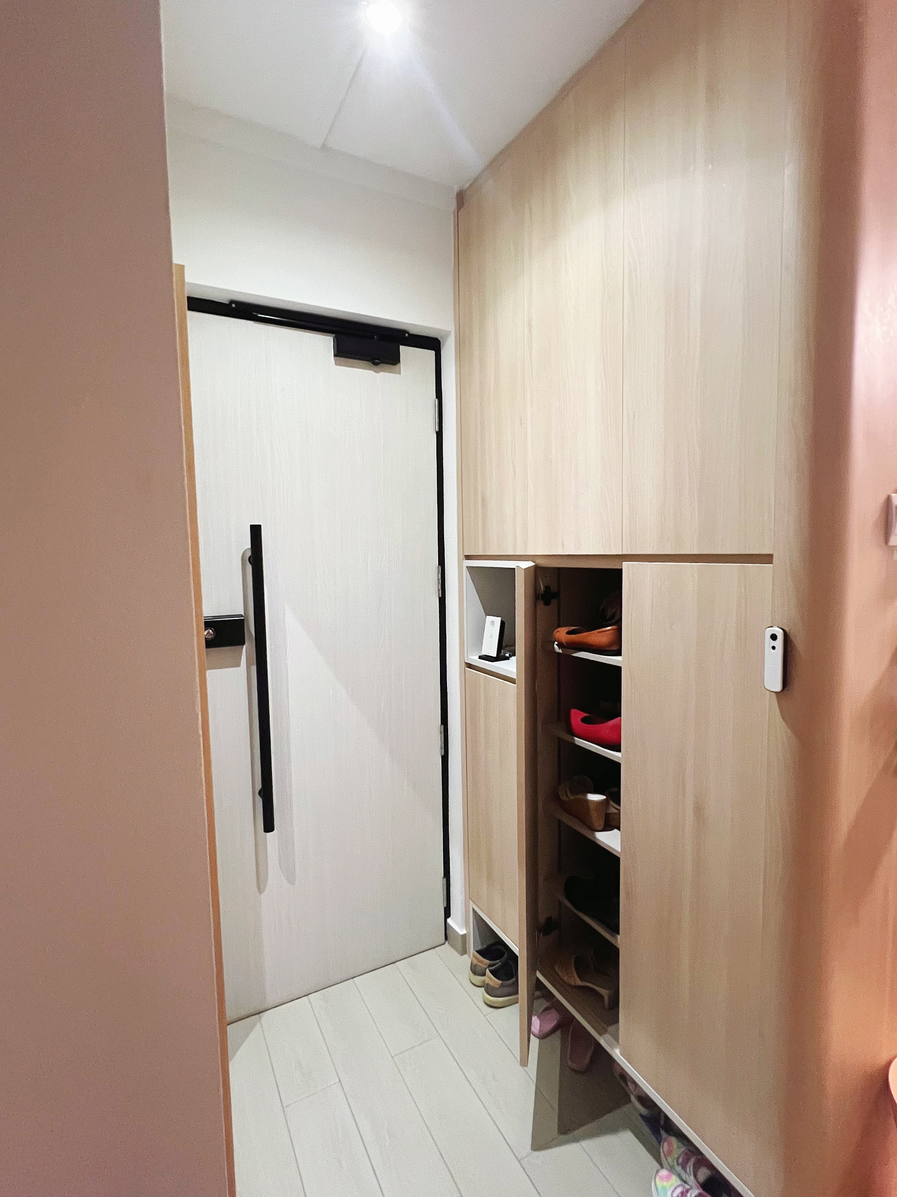Transformation of an old maisonette: Big space living with home gym - Wooden wardrobe, open door, light beige color