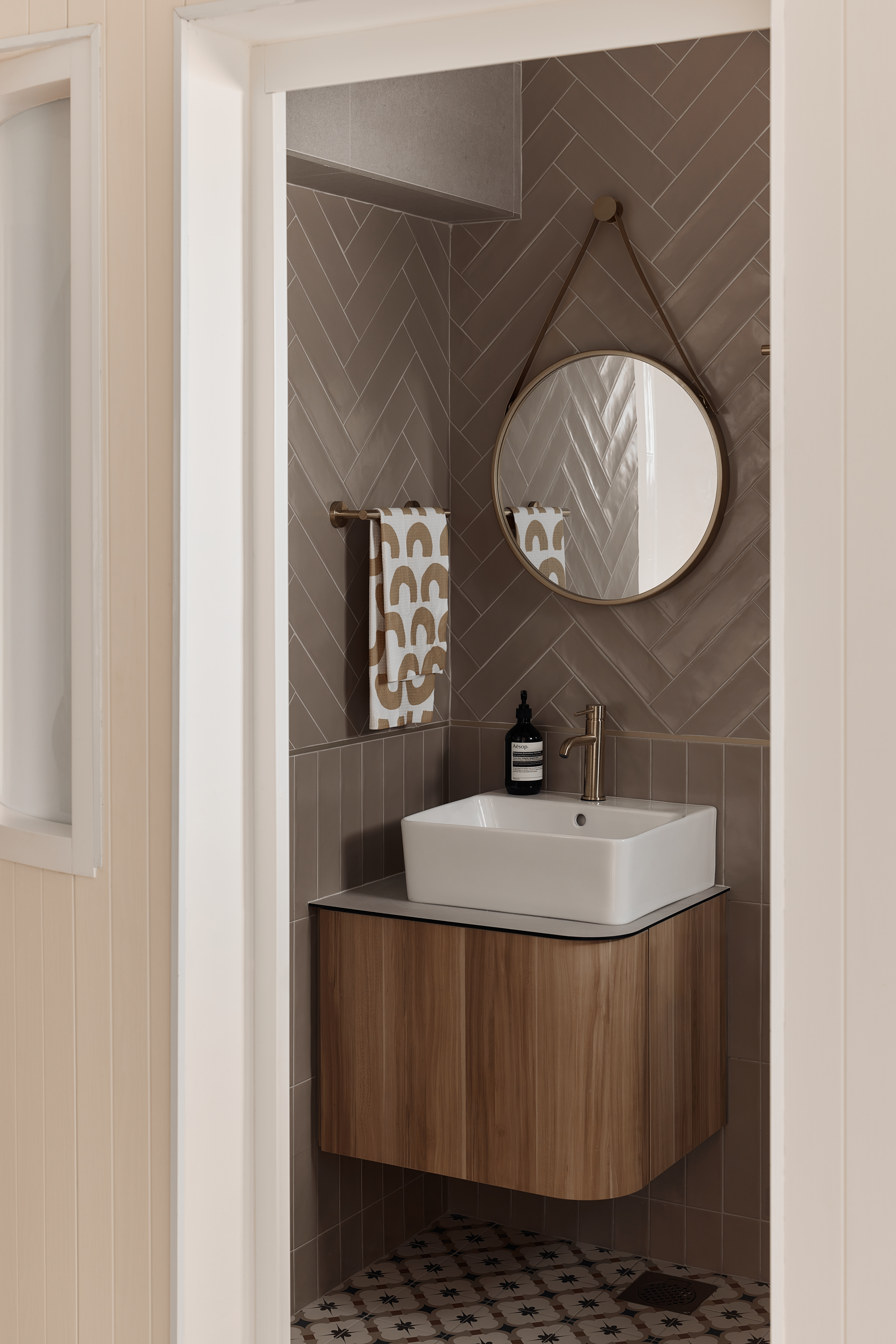 130K 5-room HDB Resale Home Tour: Warm hues, Panels, Barn door - Modern bathroom interior, herringbone tile design, white