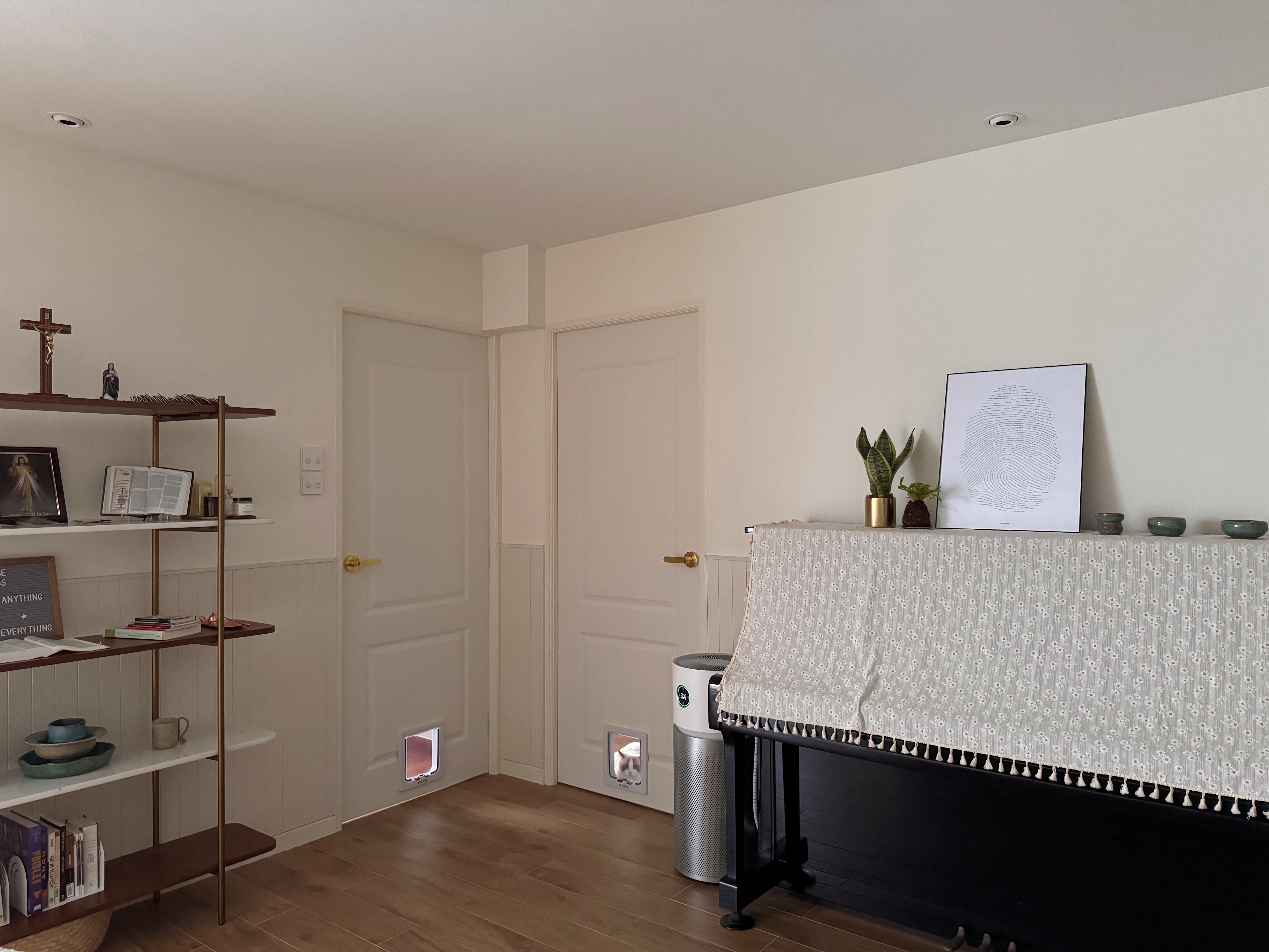 130K 5-room HDB Resale Home Tour: Warm hues, Panels, Barn door - Shelf with religious items, cross, small figurine, open