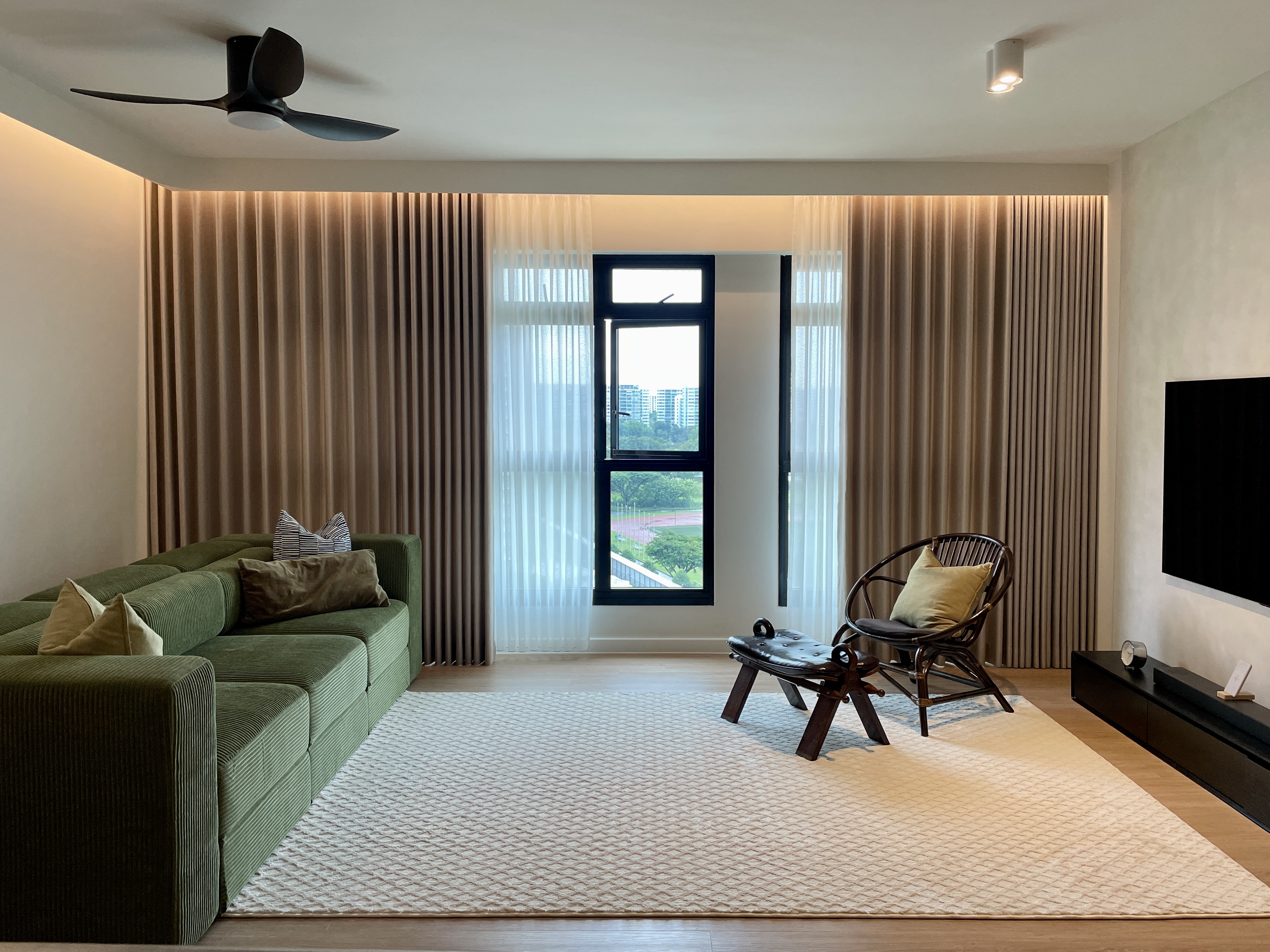 Living Room: Designing our living room around 70s -esque Green Sofa  - Green sofa, beige curtains, white window, black