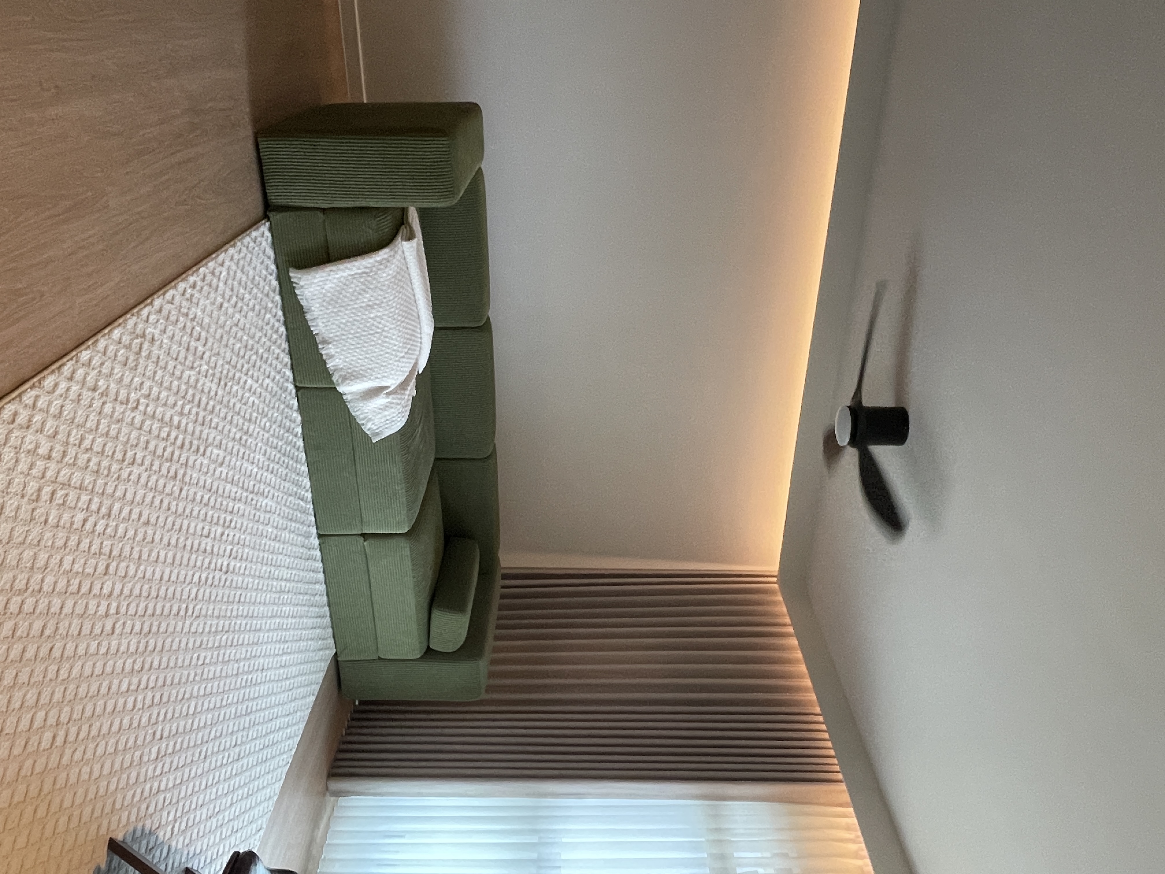 Living Room: Designing our living room around 70s -esque Green Sofa  - Green upholstered seating, textured wall, minimalist