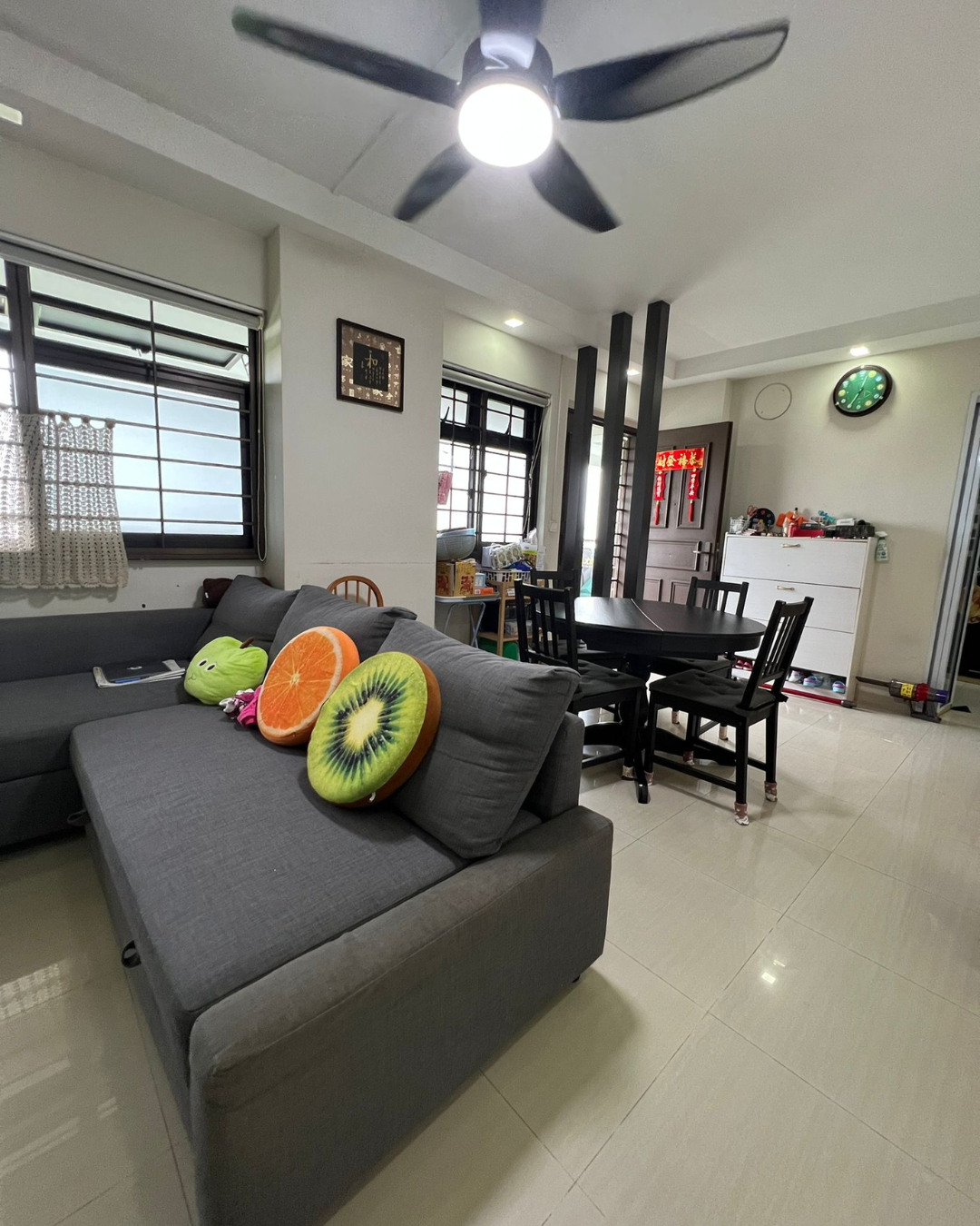 Before & After: How We Made Our Entryway Work for Us - modern living room, cozy dining area, gray sectional sofa, black