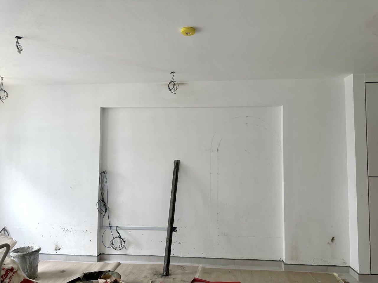 Before and after of our 40k reno! - White walls, unfinished ceiling, electrical wires, construction tools, bare floor, paint