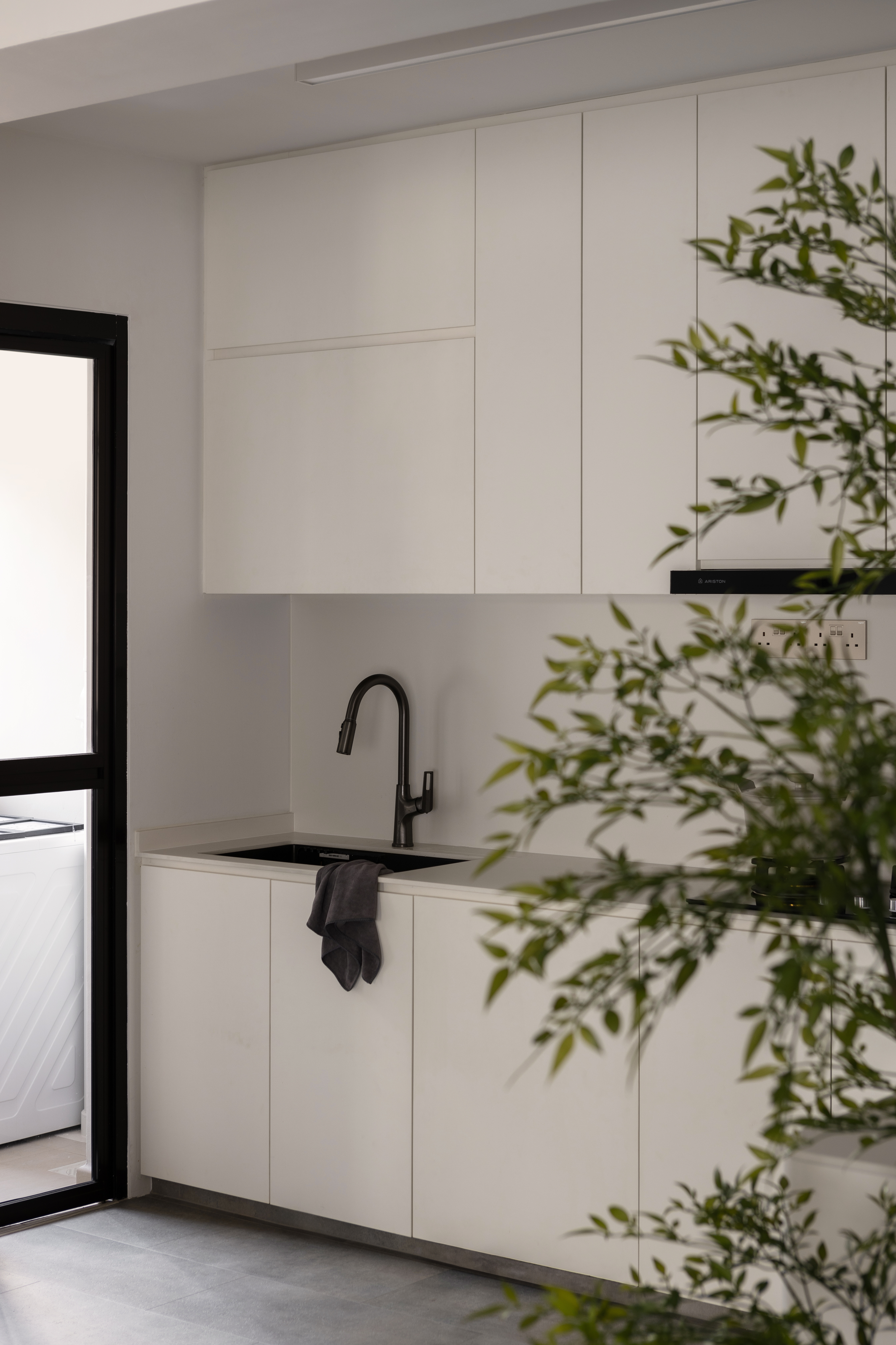 Welcome to Our Modern Wabi Sabi Haven at @ourtengahaus - White kitchen cabinetry, modern design, minimalist style, sleek