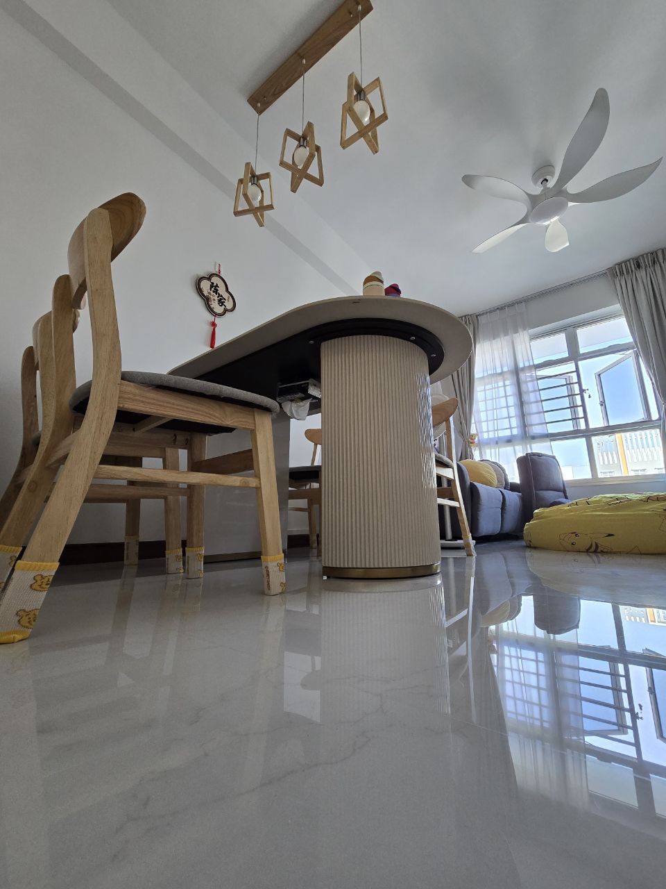 $18,000 Basic Scandinavian BTO in North - Wooden dining table, modern ceiling fan, star-shaped light fixture, wooden chairs