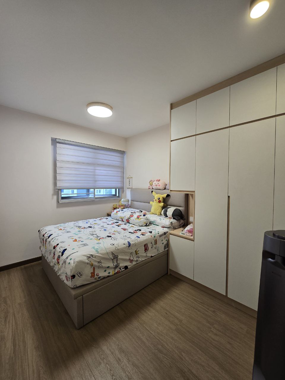 $18,000 Basic Scandinavian BTO in North - Children's bedroom with modern design, wooden flooring, and soft lighting