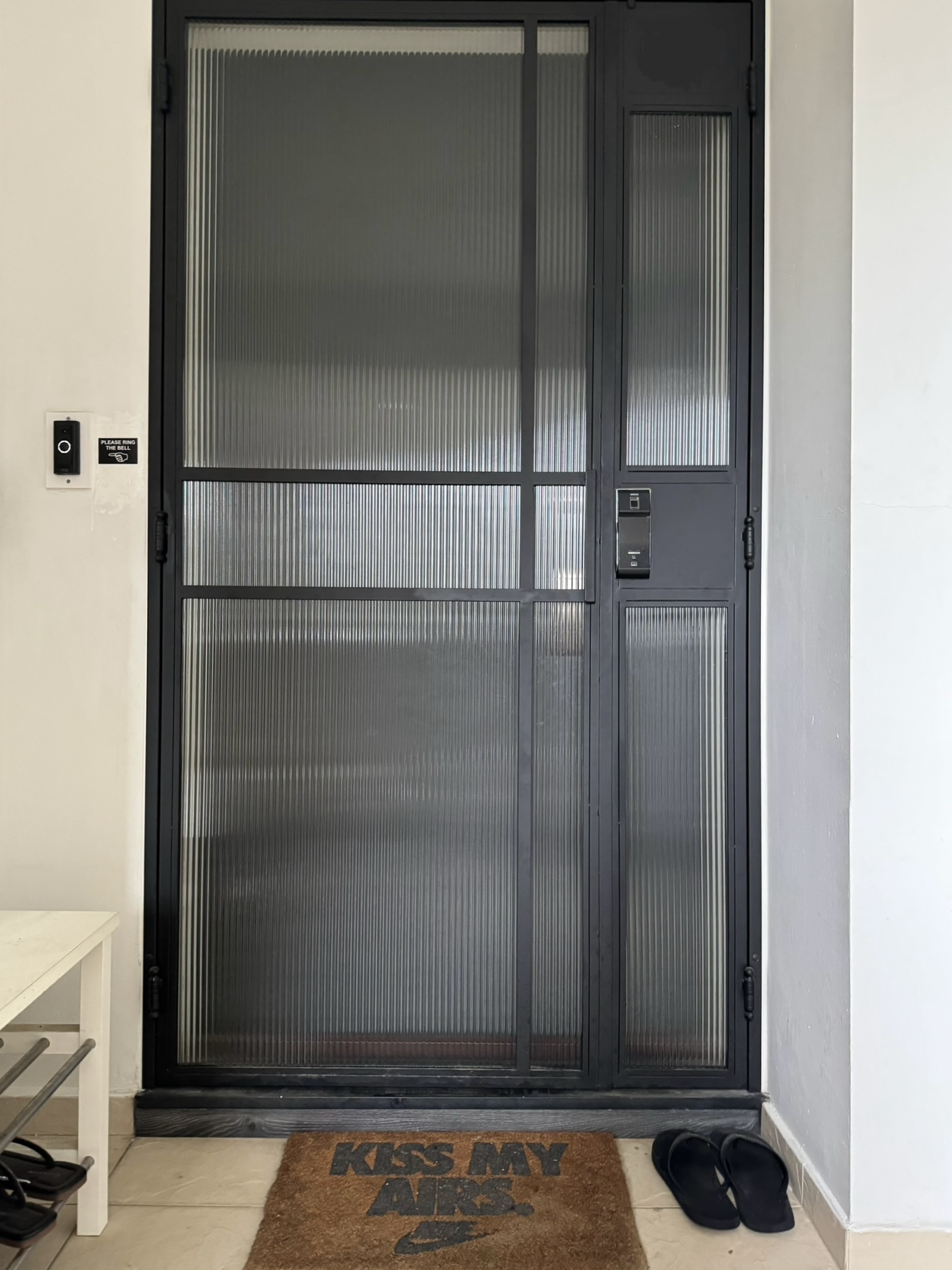 Entryway: A Minimalist and Stylish Welcome to Our Home - Glass door, black frame, textured glass, modern design, minimalist