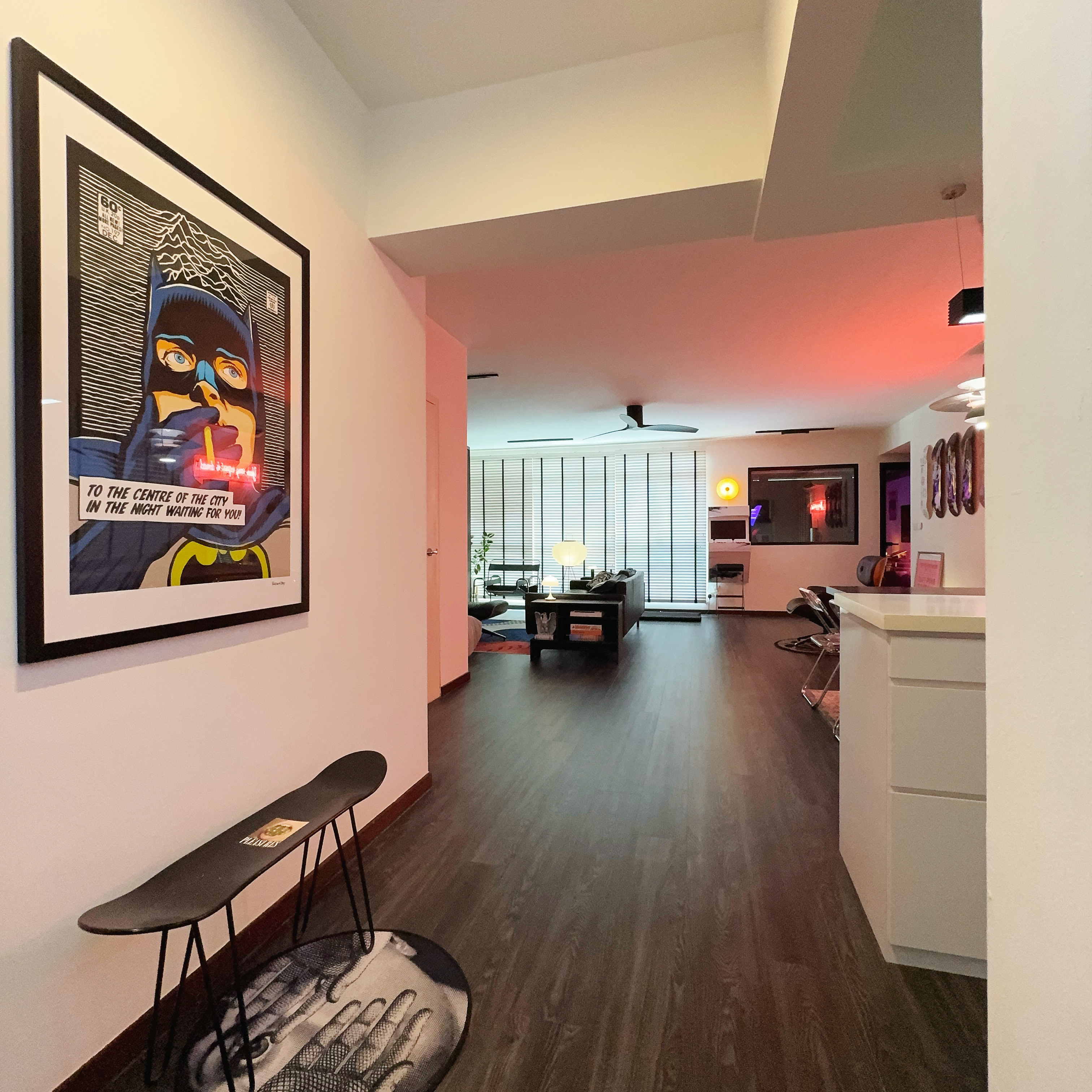 Entryway: A Minimalist and Stylish Welcome to Our Home - Modern living room with contemporary decor, Artwork featuring Batman