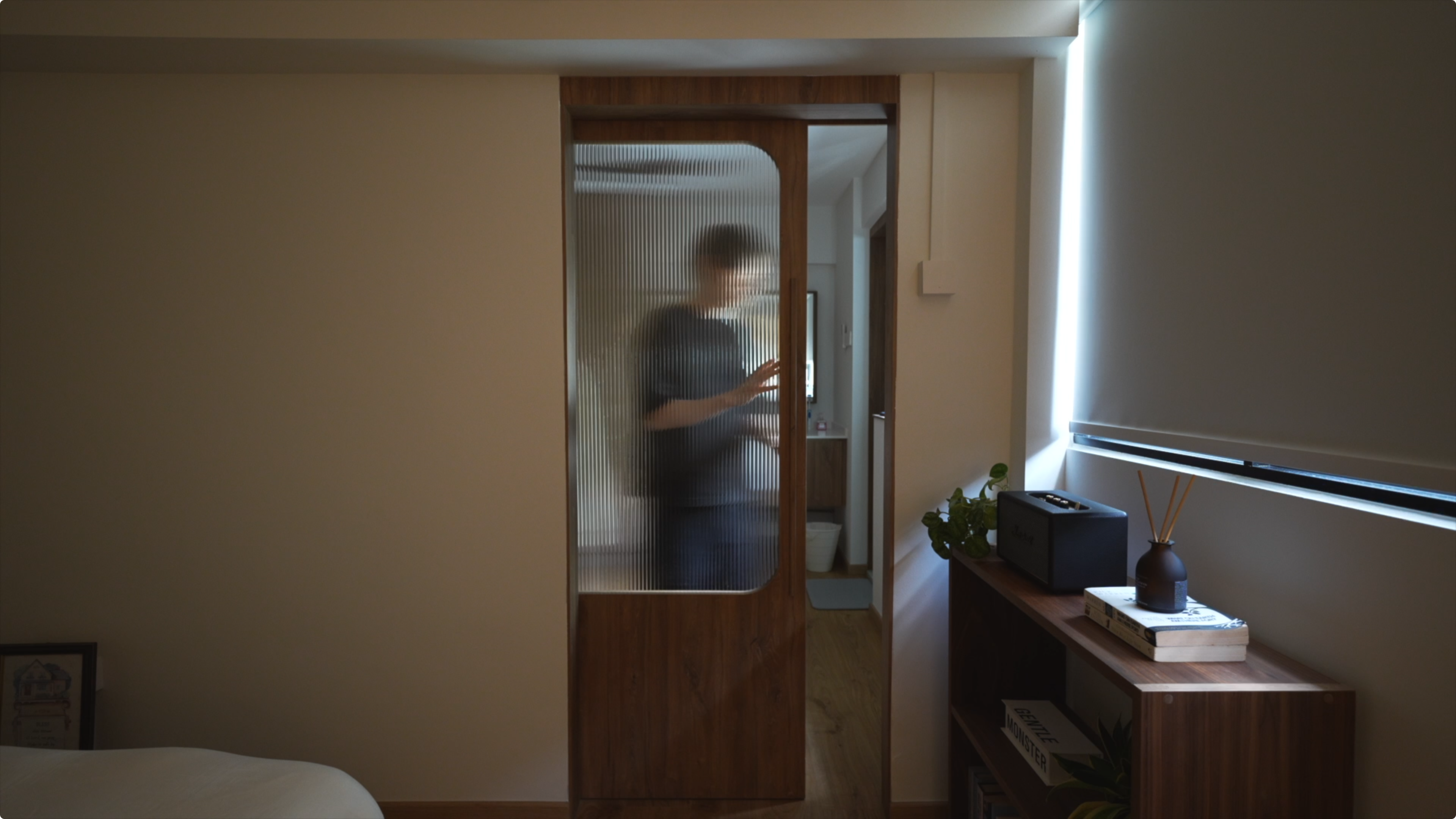 Slow Living at Its Finest: A Tour of Our Thoughtfully Designed Home - Interior view of a room with a wooden door, beige