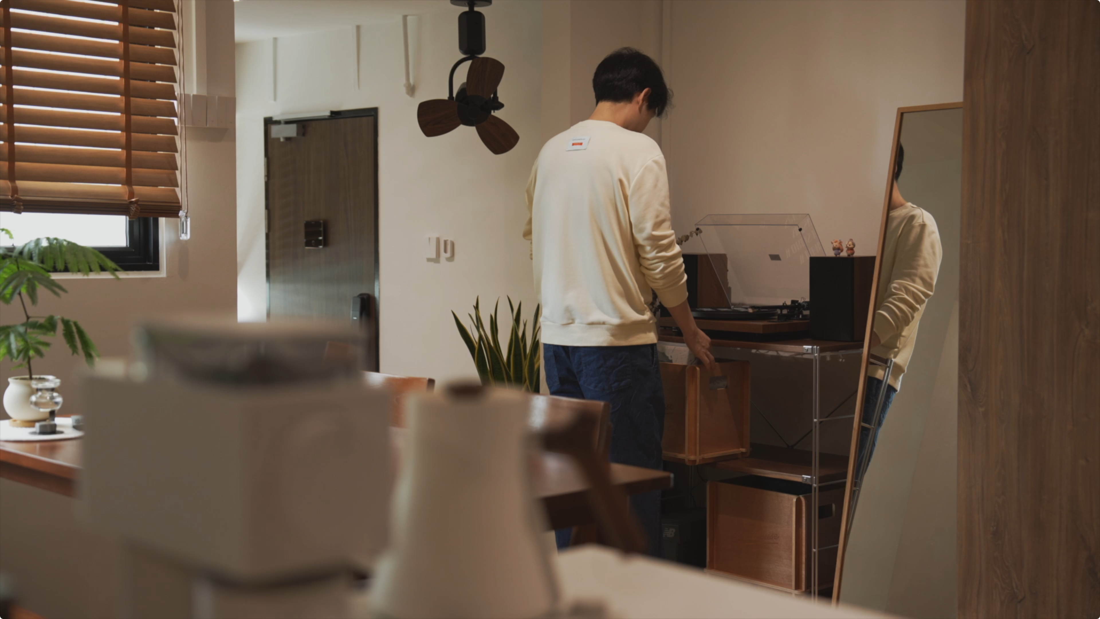 Slow Living at Its Finest: A Tour of Our Thoughtfully Designed Home - Wooden blinds, modern interior, person standing, beige