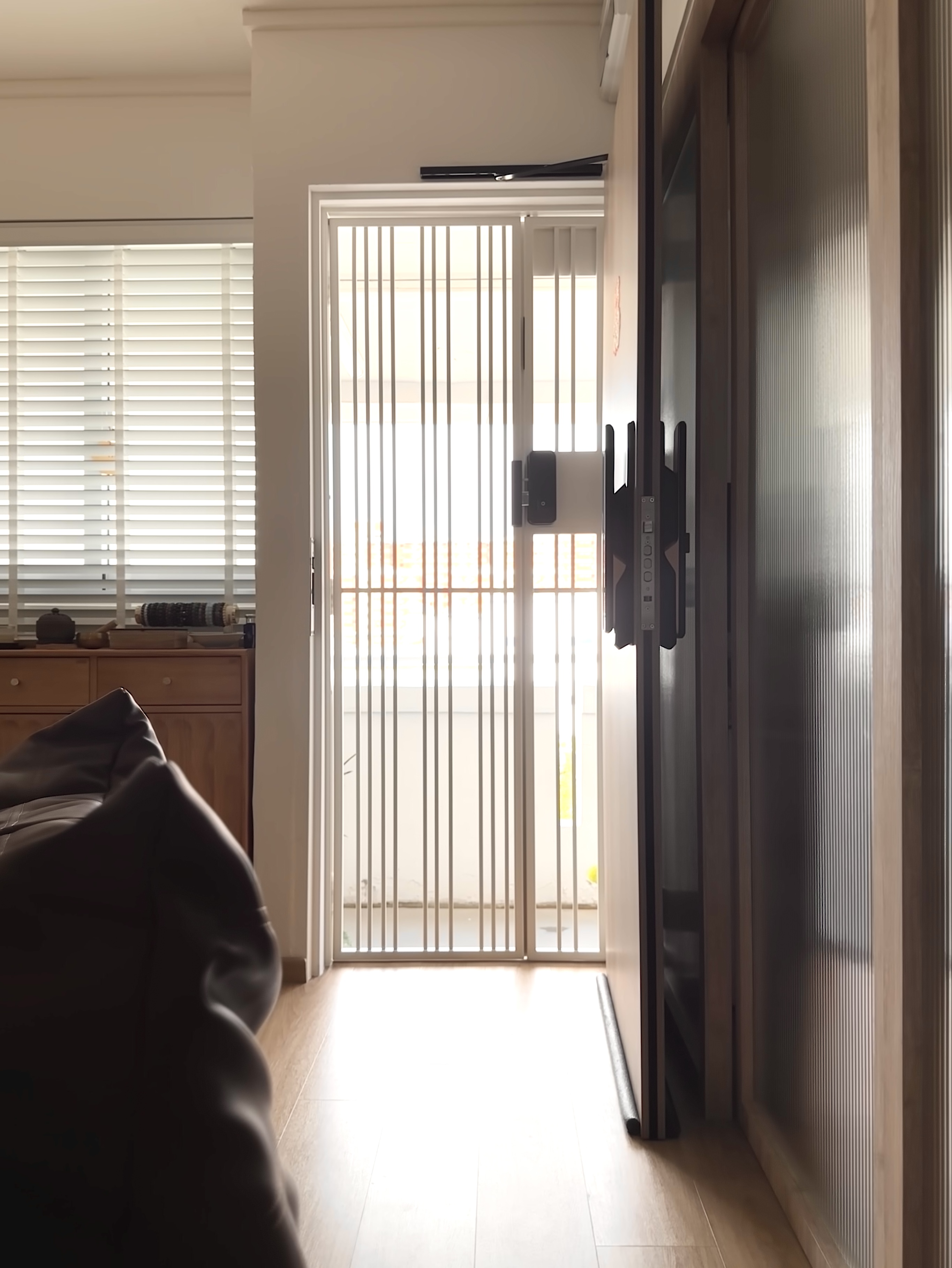 A Bright & Inviting Japandi-Inspired Entryway with No Built-ins!  - Wooden floor, sliding glass door, blinds, natural light
