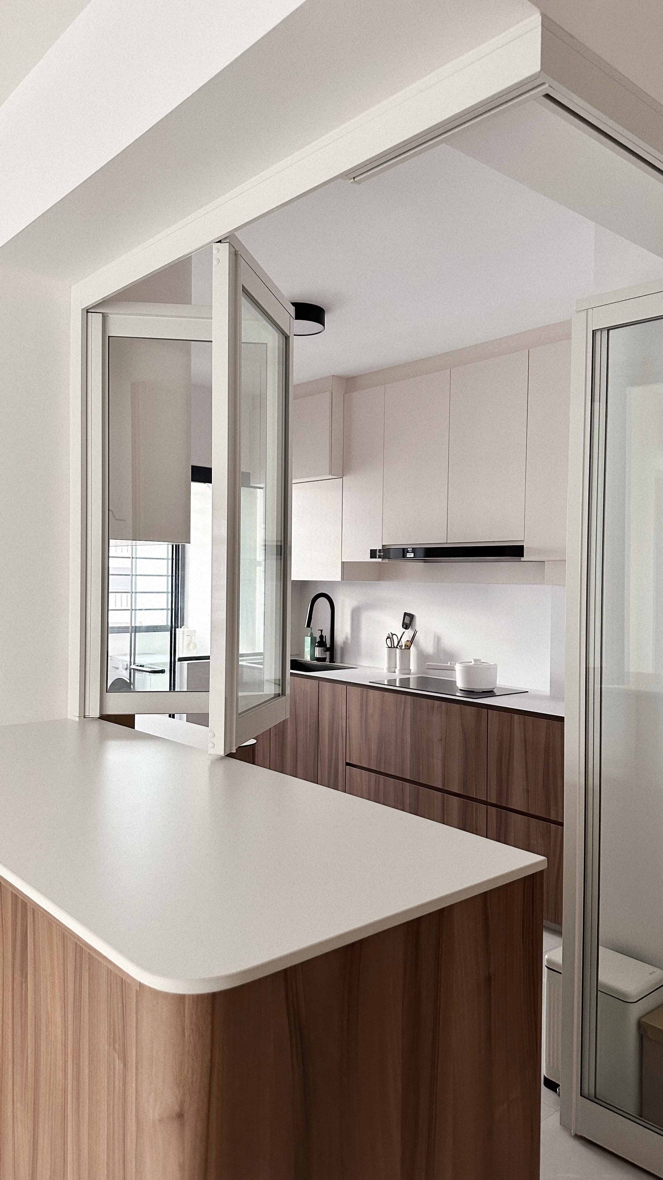 Living Simply, Loving Deeply | Sengkang 4 Room HDB Resale - Modern kitchen with sleek design, minimalist cabinetry, large