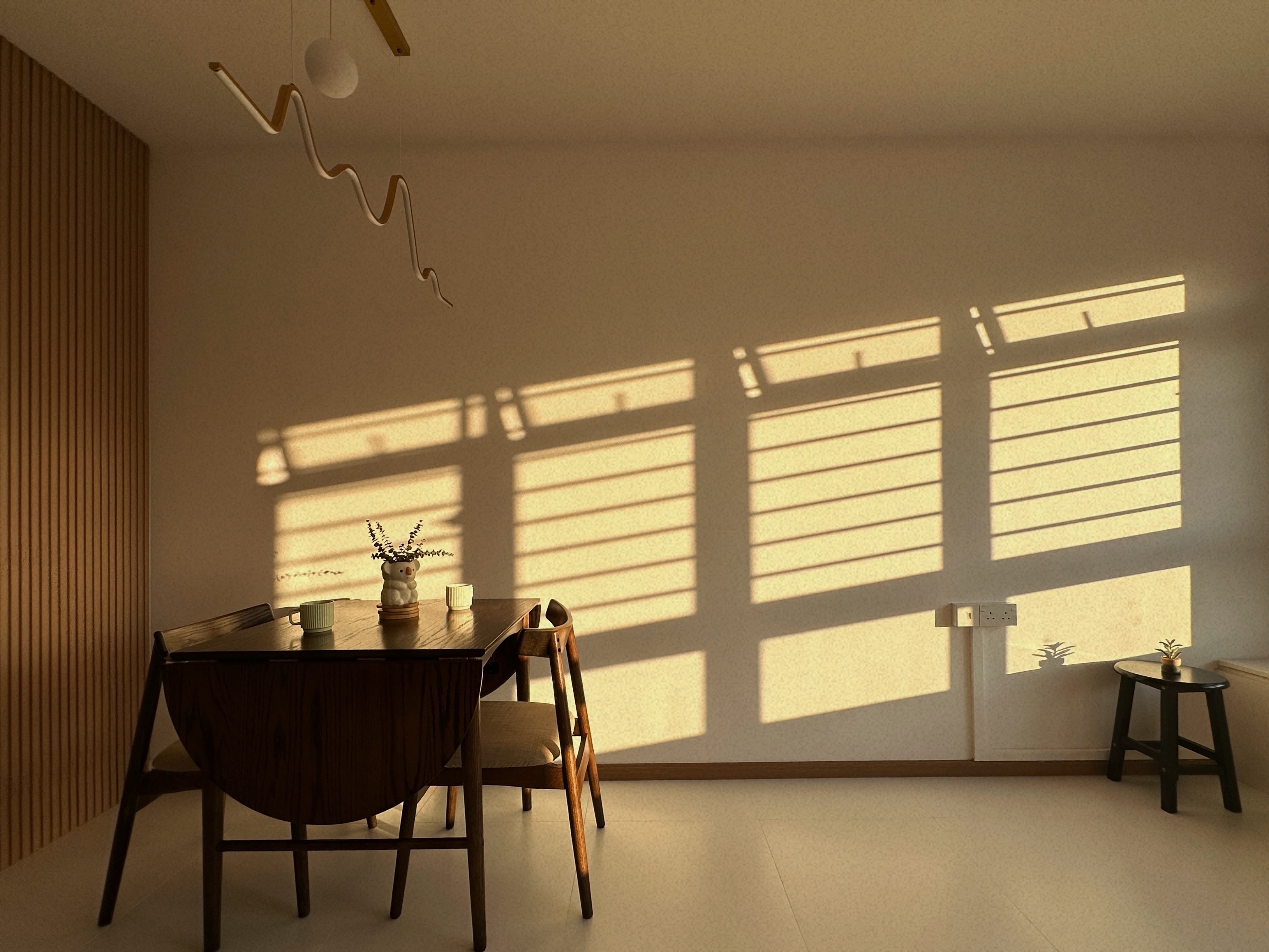 Living Simply, Loving Deeply | Sengkang 4 Room HDB Resale - Sunlight streaming through window casts intricate shadows, warm