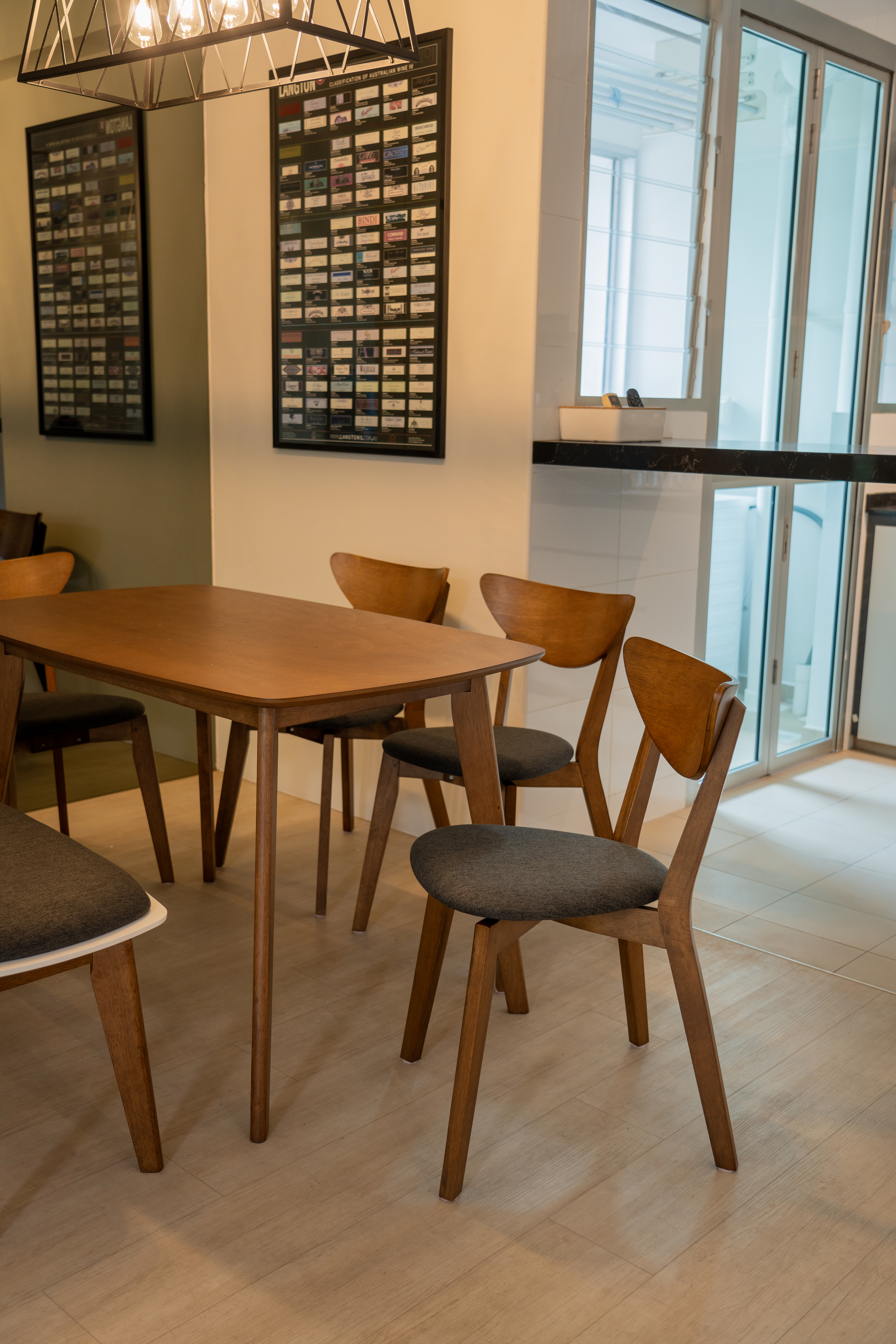 Minimalist Home With A Bright Airy Feel - Modern dining room with wooden table and chairs, contemporary design, minimalist