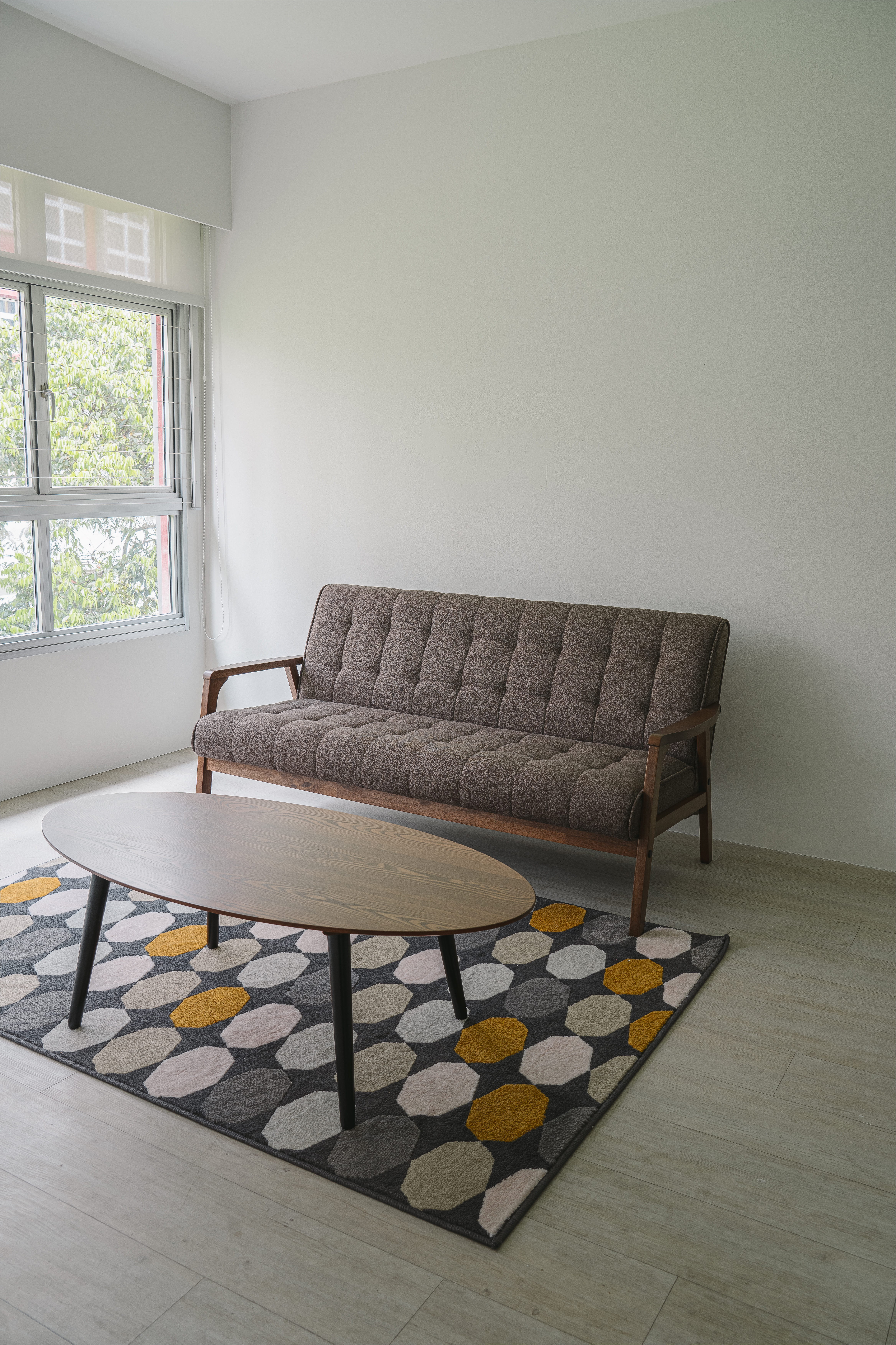 Minimalist Home With A Bright Airy Feel - Modern minimalist living room, contemporary sofa, wooden frame, geometric rug