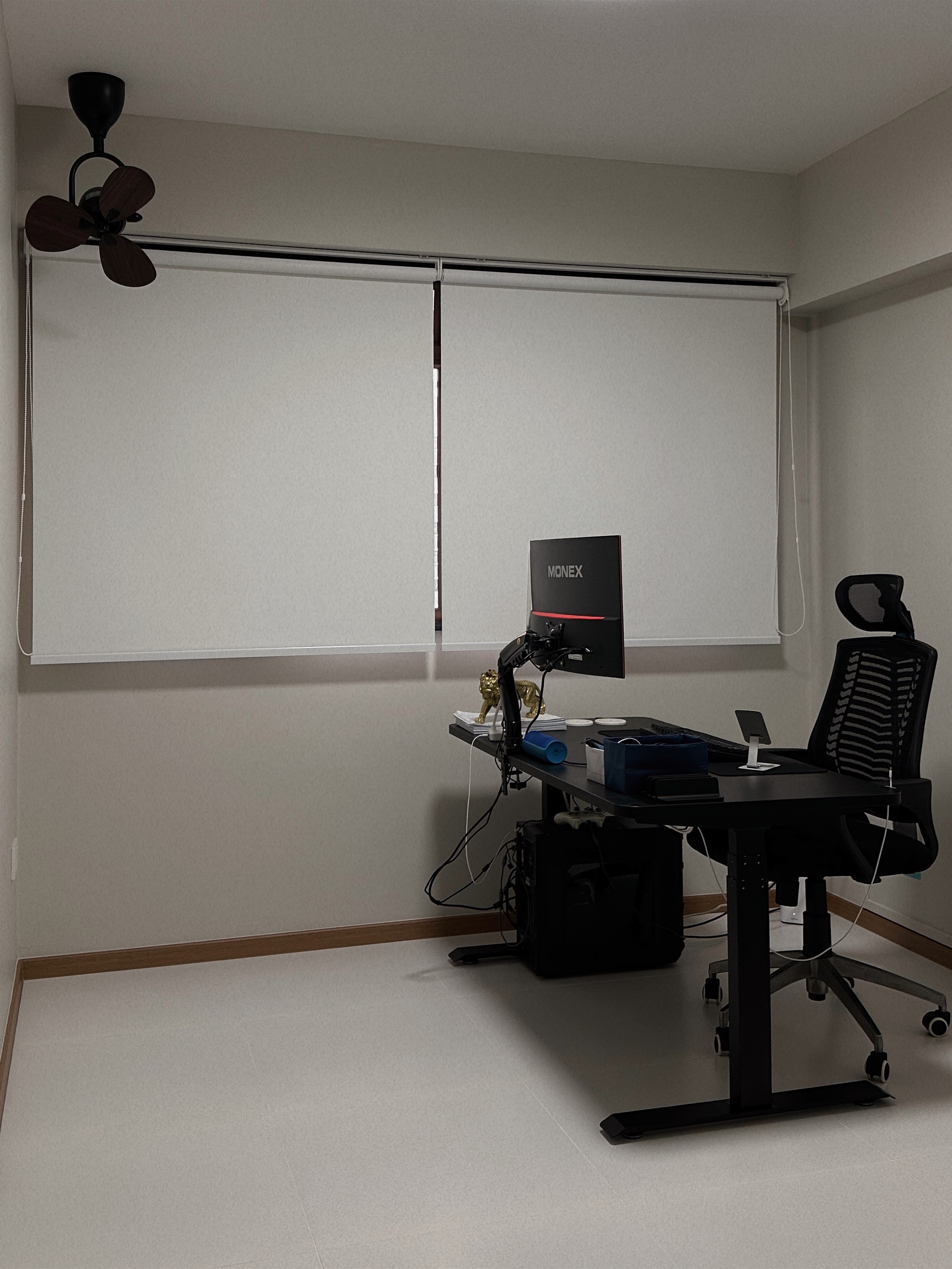 Living Simply, Loving Deeply | Sengkang 4 Room HDB Resale - Office desk with dual monitor, black office chair, gold lion