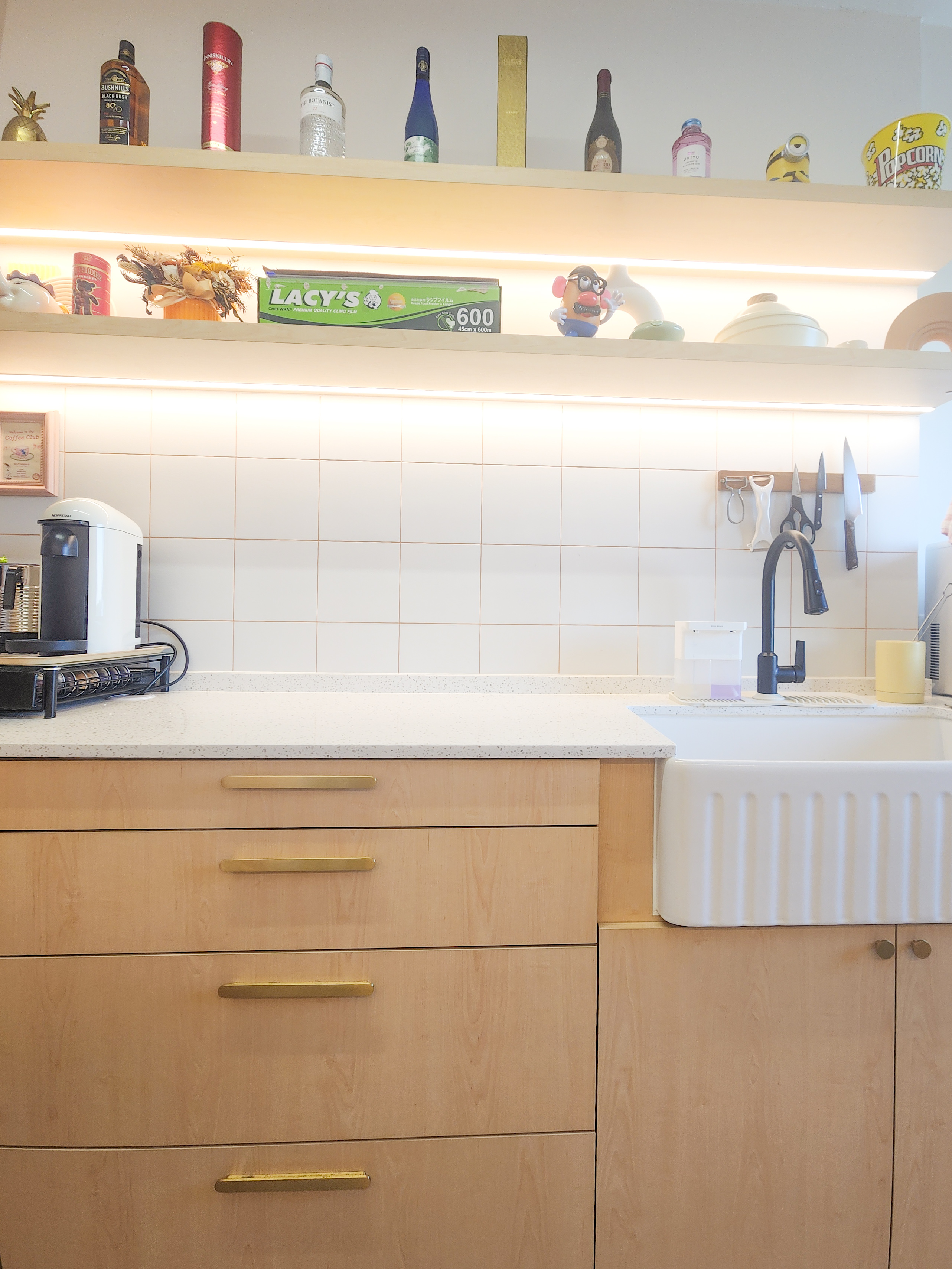 Step inside a chef's kitchen - closed concept, functional & aesthetic - Wooden kitchen cabinets, white countertop, black