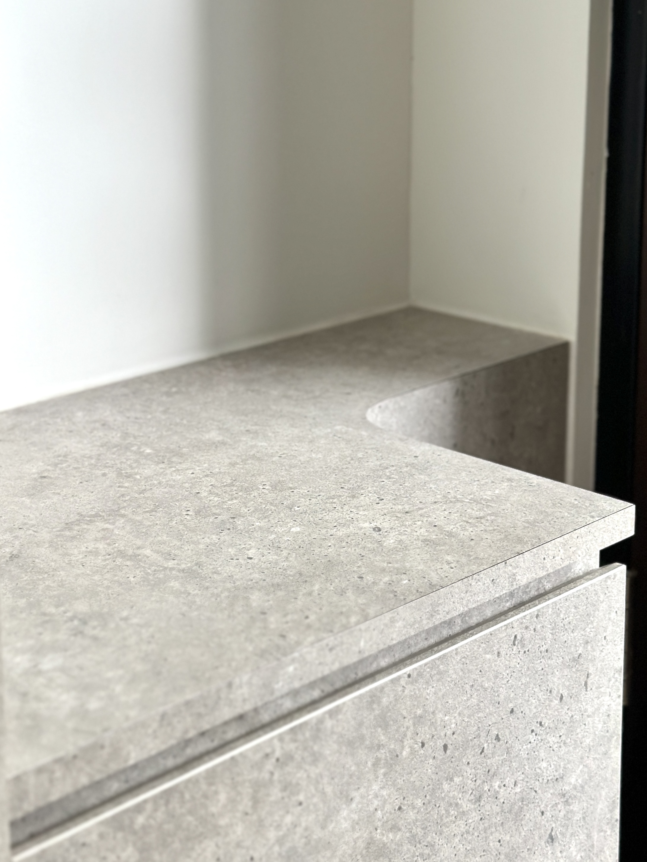 Entryway That Speaks Minimalism & Modern Life - gray concrete surface, minimalist design, modern decor, textured finish
