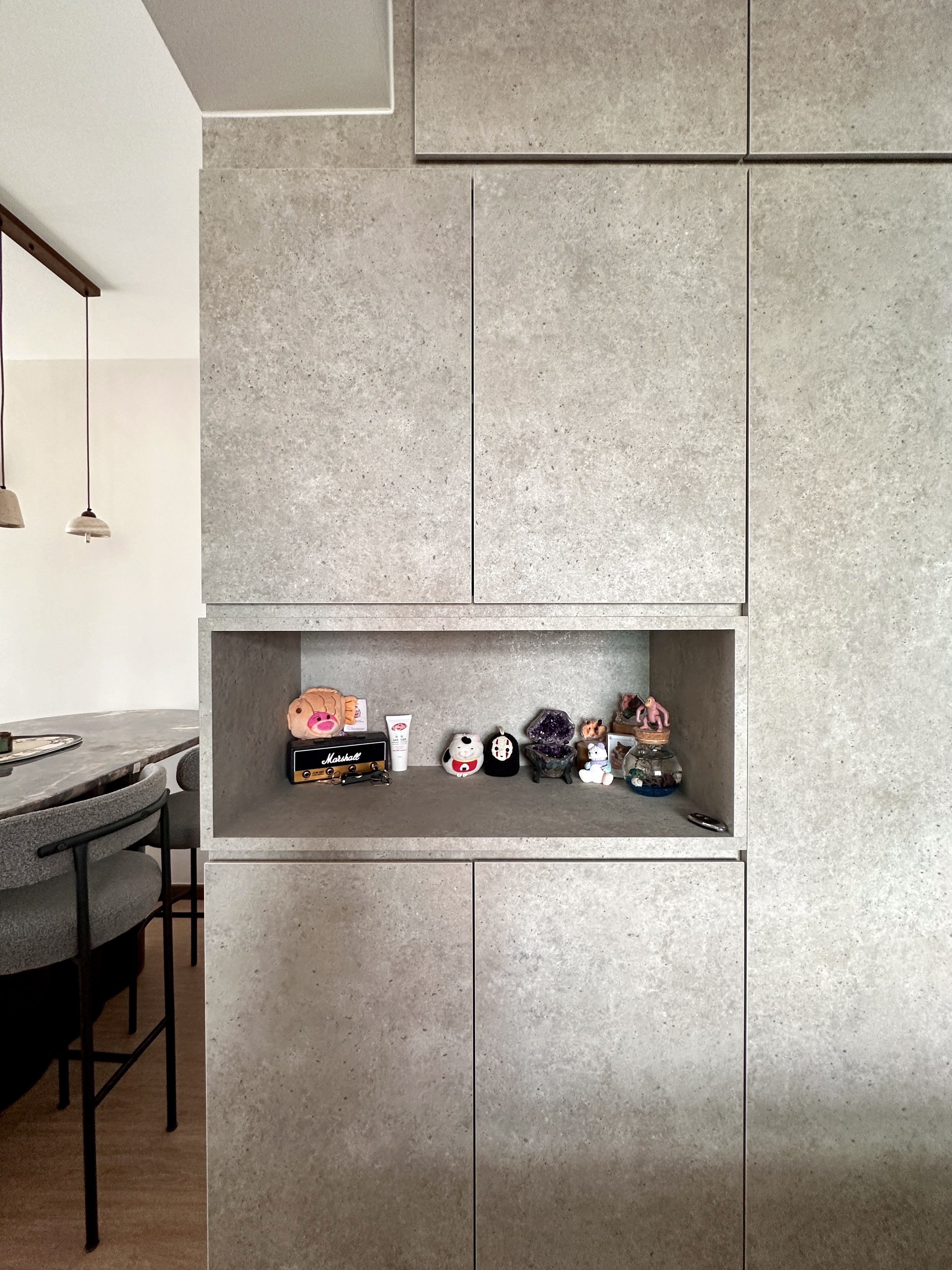 Entryway That Speaks Minimalism & Modern Life - modern kitchen countertop, minimalist design, textured gray wall, built-in