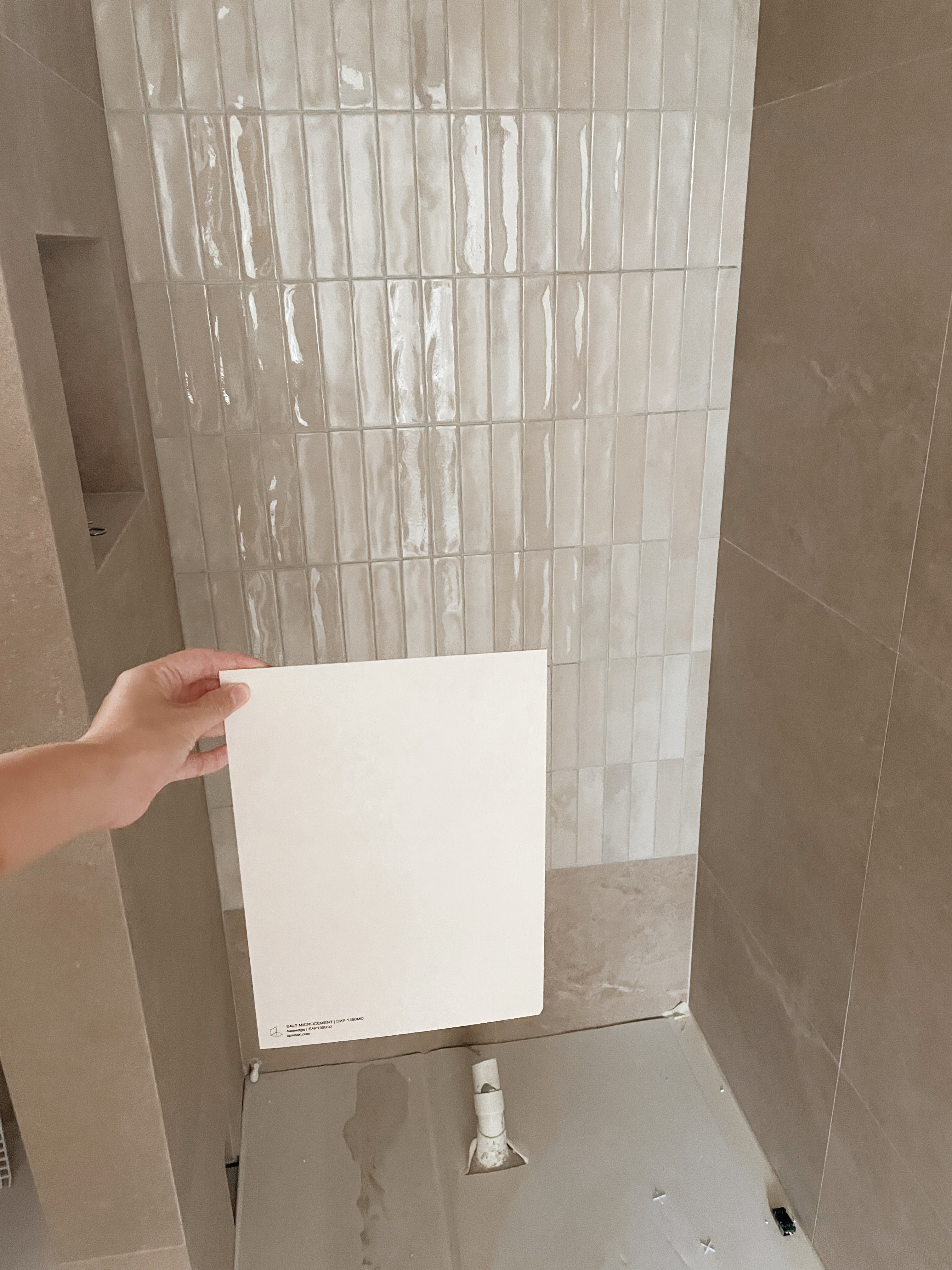 Tile Your Way to a Stunning Renovation: Tips from Loafy.Haus - Tiled bathroom wall, tiled shower area, beige tiles, bathroom