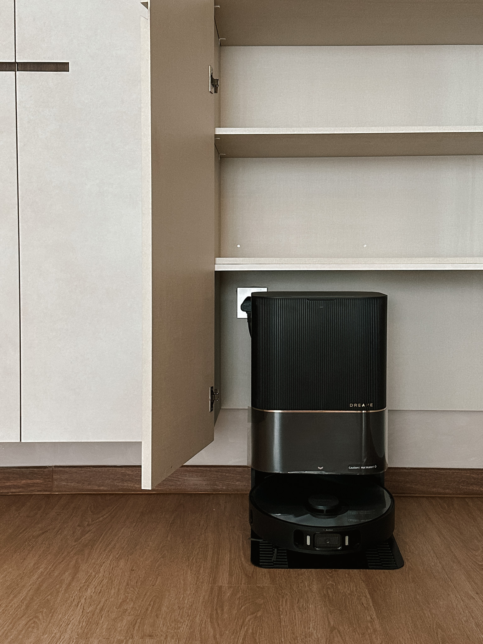 Our Cosy Entryway: Limewashed with practical storage solutions - Dedicated space, minimalist design, sleek black robot