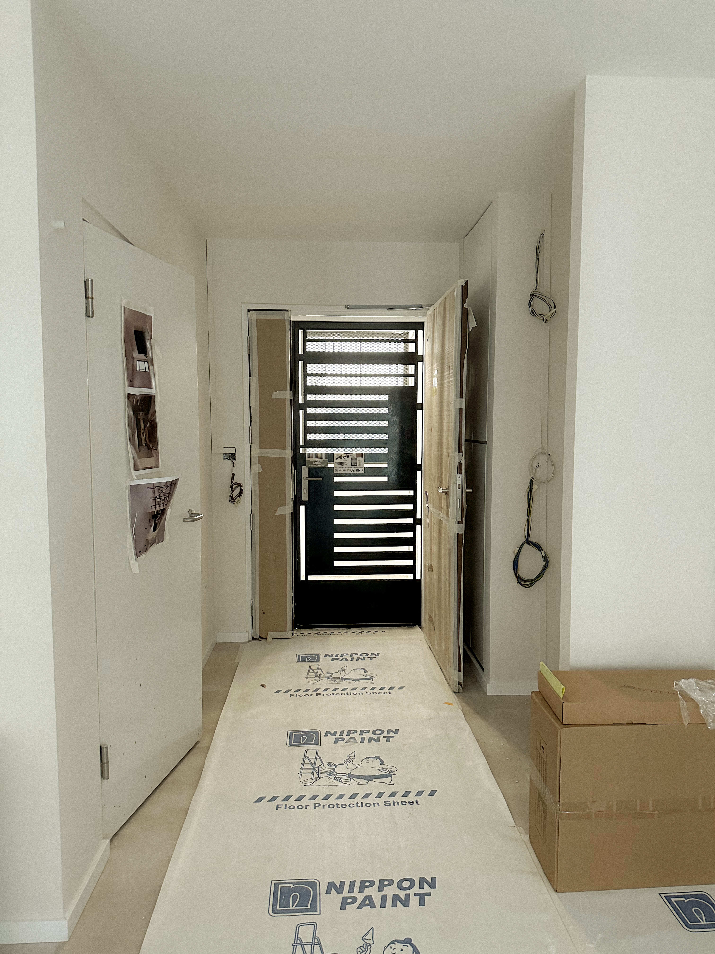 Doorbusters: Transforming Our Entryway 🚪 - Floor protection sheet, Nippon Paint, cardboard box, electrical cords, black