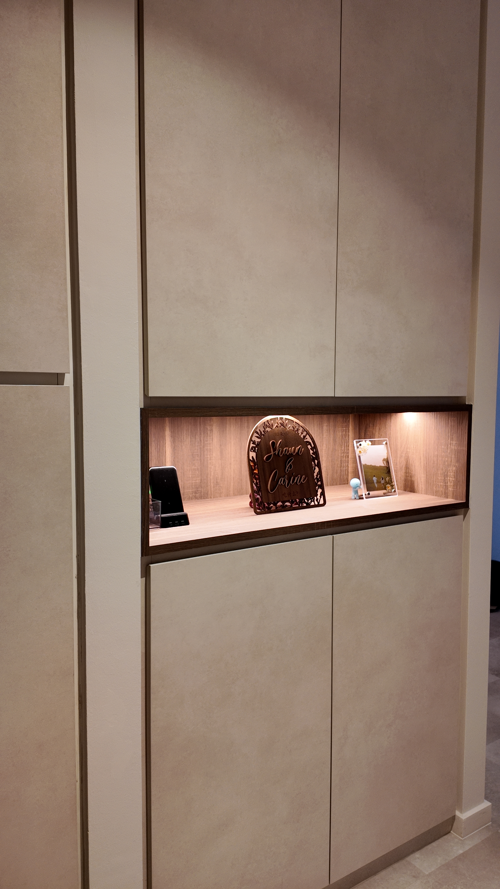 Doorbusters: Transforming Our Entryway 🚪 - Shelf display, minimalist design, beige cabinets, wooden accents, decorative