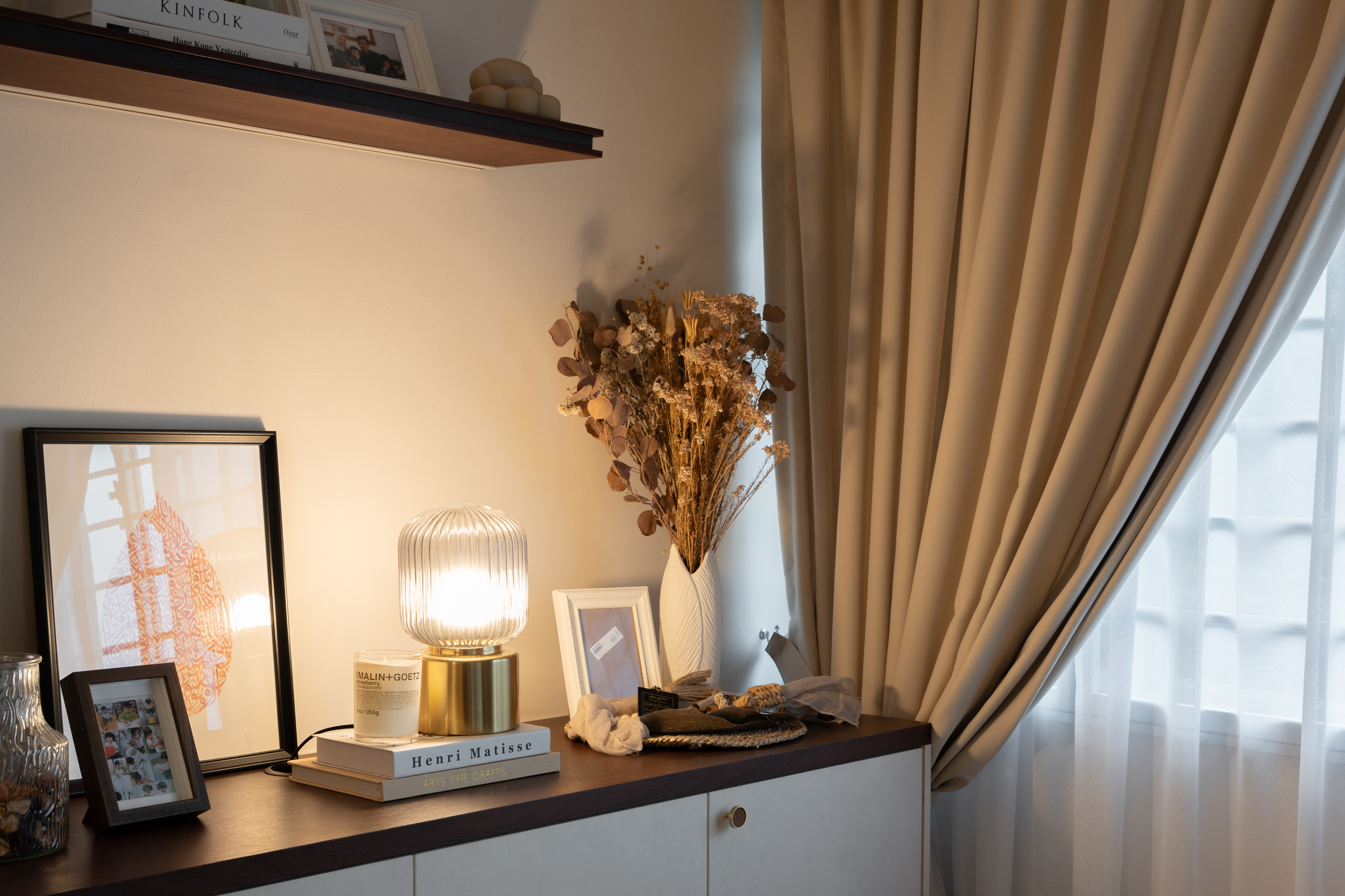 Entryway Essentials: Style, Storage and a touch of our personality! - Warmly lit room, beige curtains, soft lighting, cozy