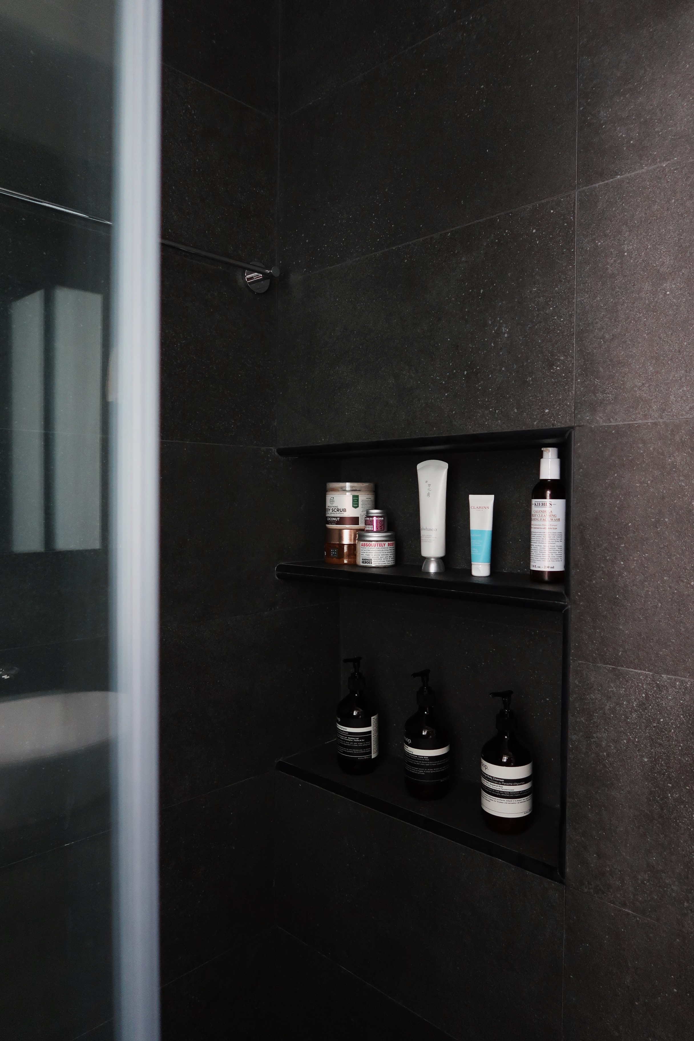 43K Reno Without An ID | Our 4-Room BTO In The Central - Shower area with sleek black tiles, modern design, minimalist decor