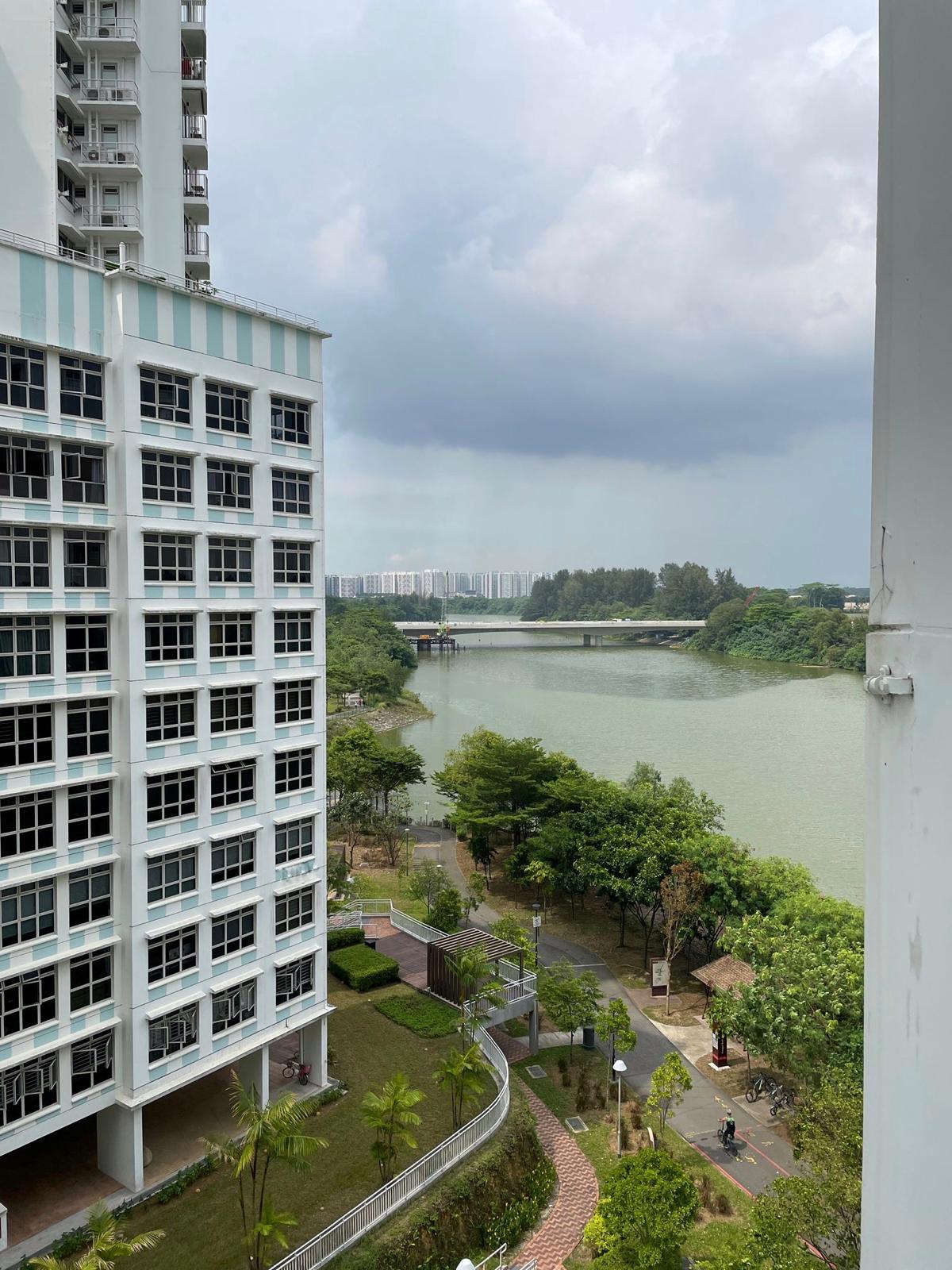 Our House-Hunting Journey: Finding 'the One' or Not? - Modern apartment building, multi-story structure, white facade, blue