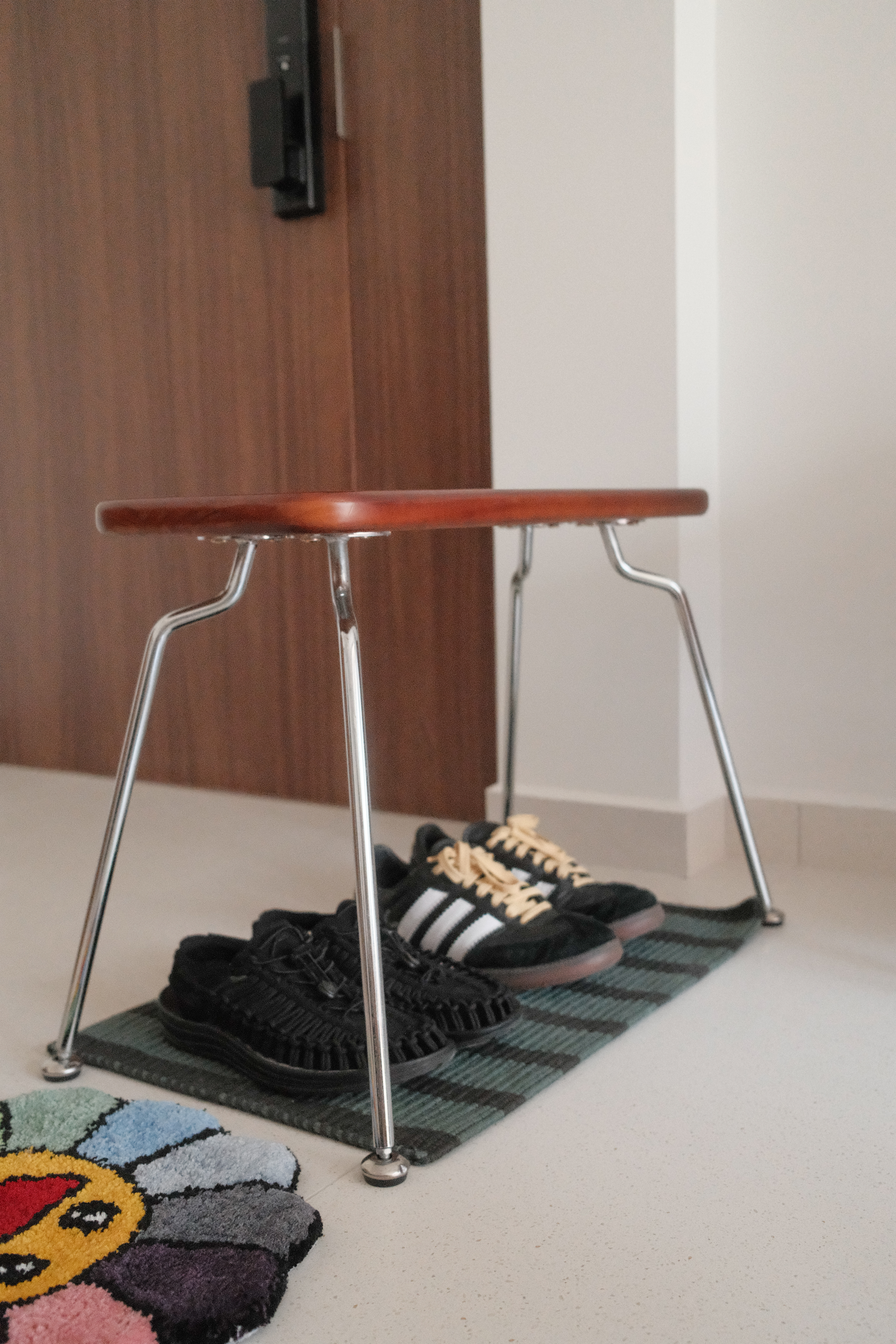 Open and Spacious Entry Way with Zero Built-in Carpentry - modern minimalist table, sleek metal legs, wooden top, colorful