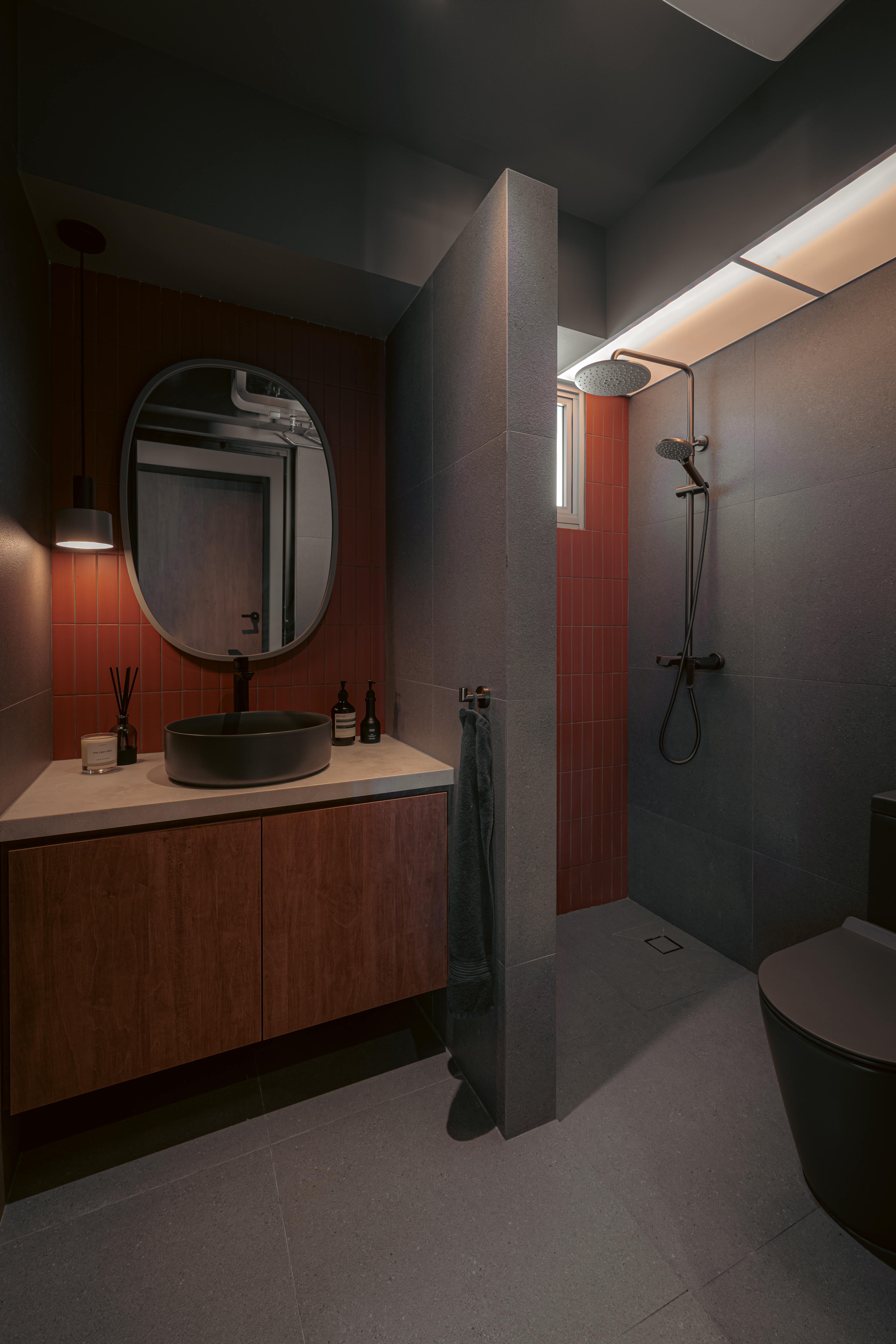 His & Hers Bathrooms - Design ideas to make your bathrooms memorable  - Modern bathroom with sleek design, dark gray and red