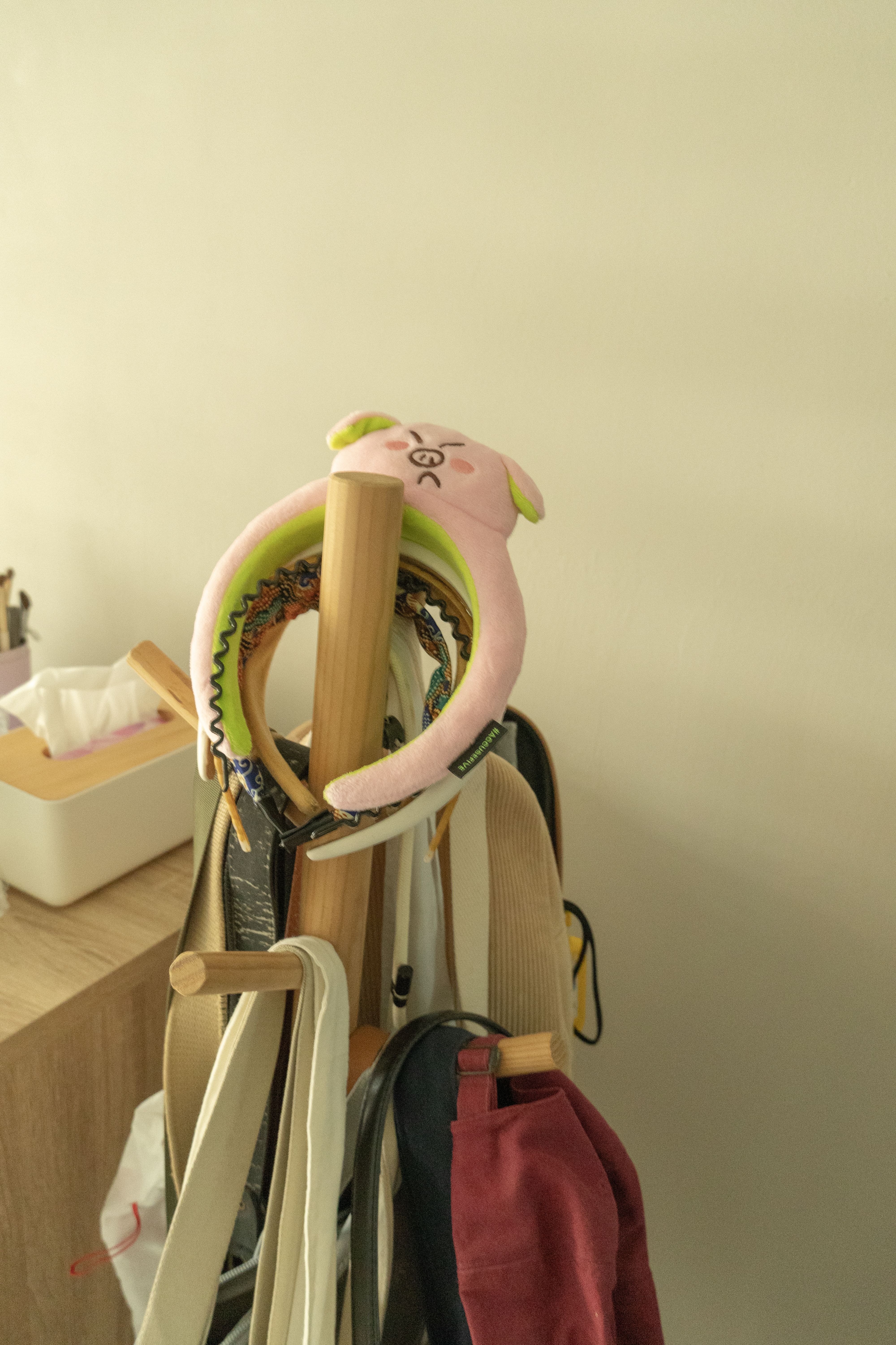 Get unready with me | A minimalistic bedroom entryway   - pink unicorn backpack, wooden hanger, colorful straps, beige bag