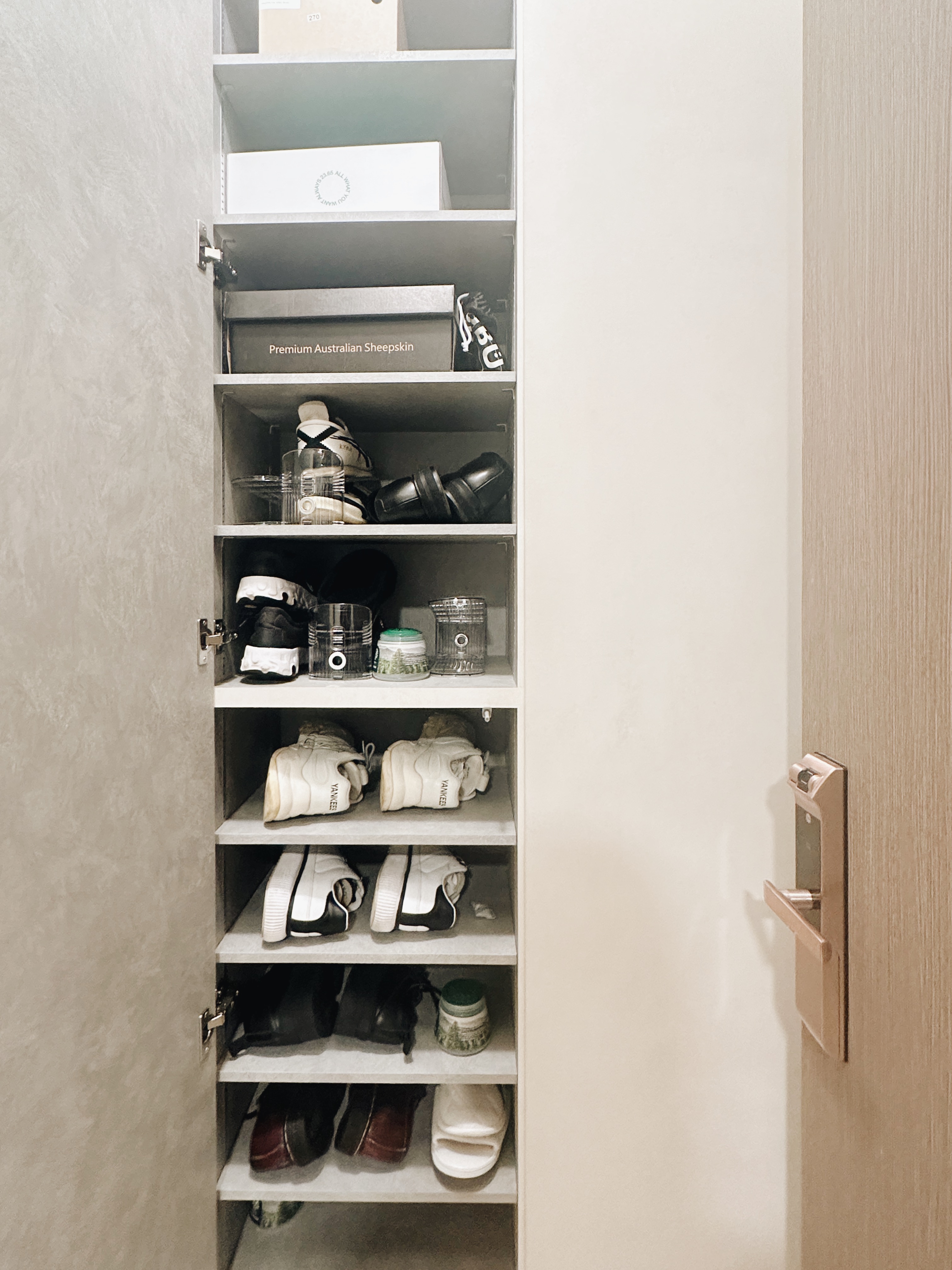 A Minimalist Entryway Makeover for our 3-bedder Condo - Shoes, shoes, shoes on shelves, shoes organized, shoes neatly