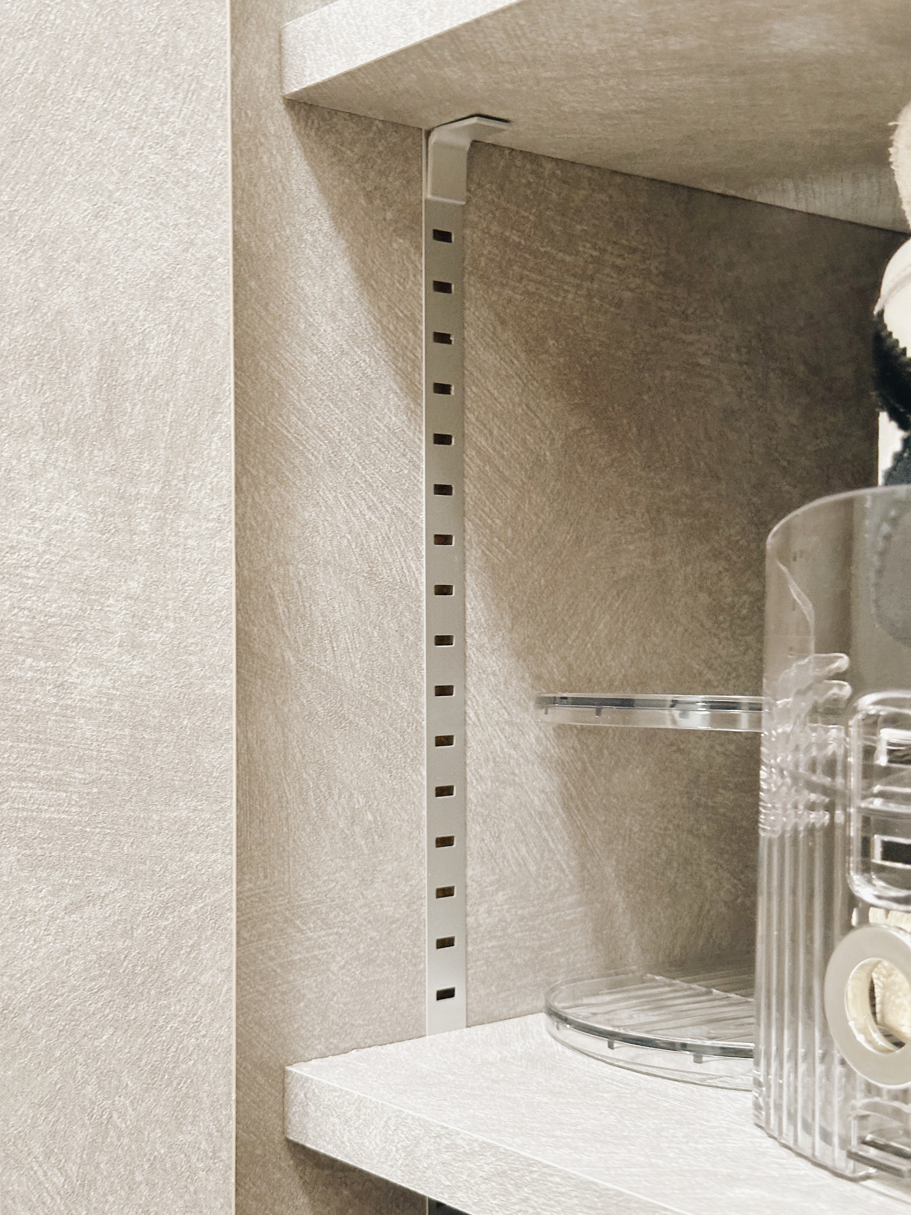 A Minimalist Entryway Makeover for our 3-bedder Condo - Shelf with integrated shelving unit, beige textured wall, minimalist