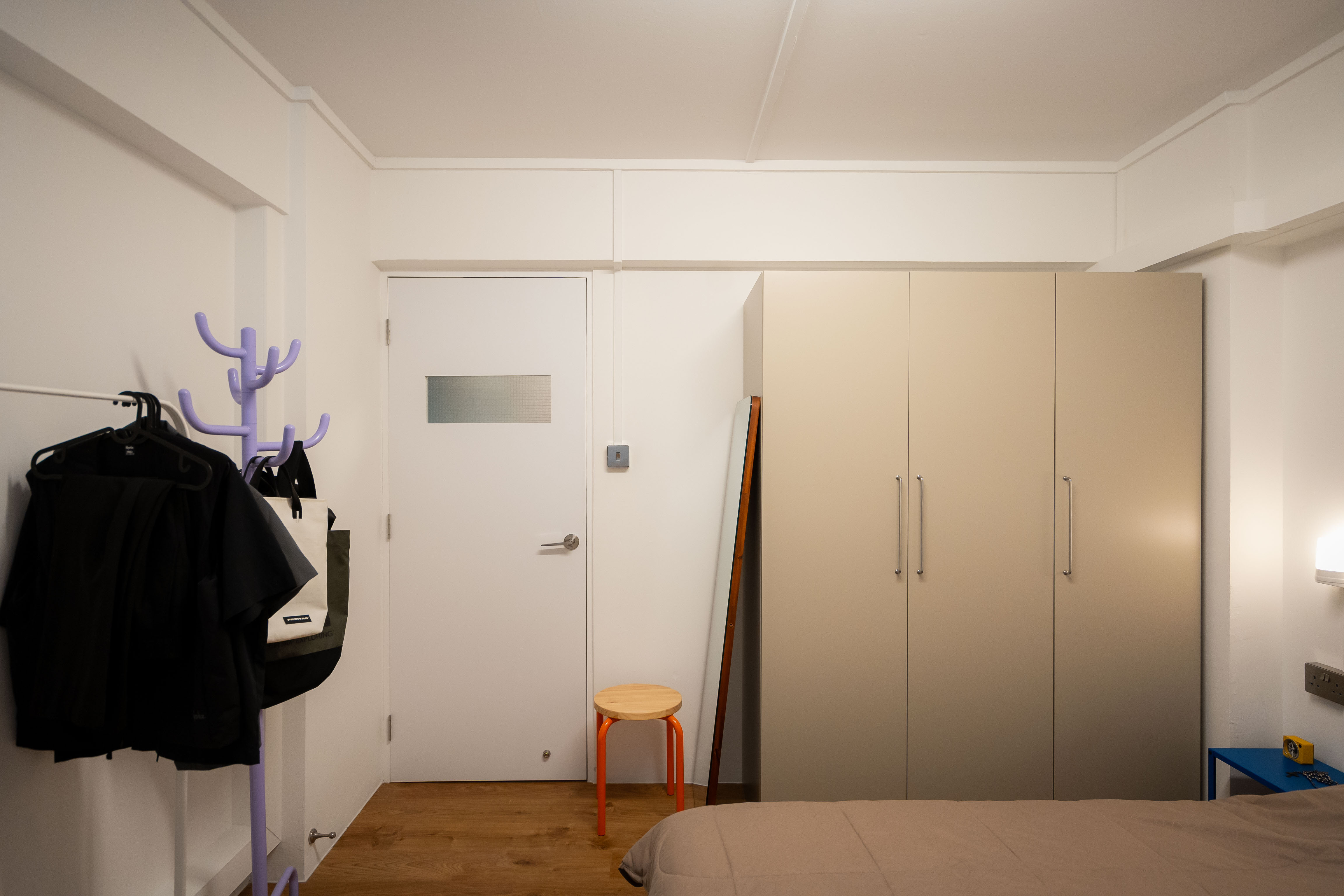 Using colour to spruce up a minimalist bedroom!