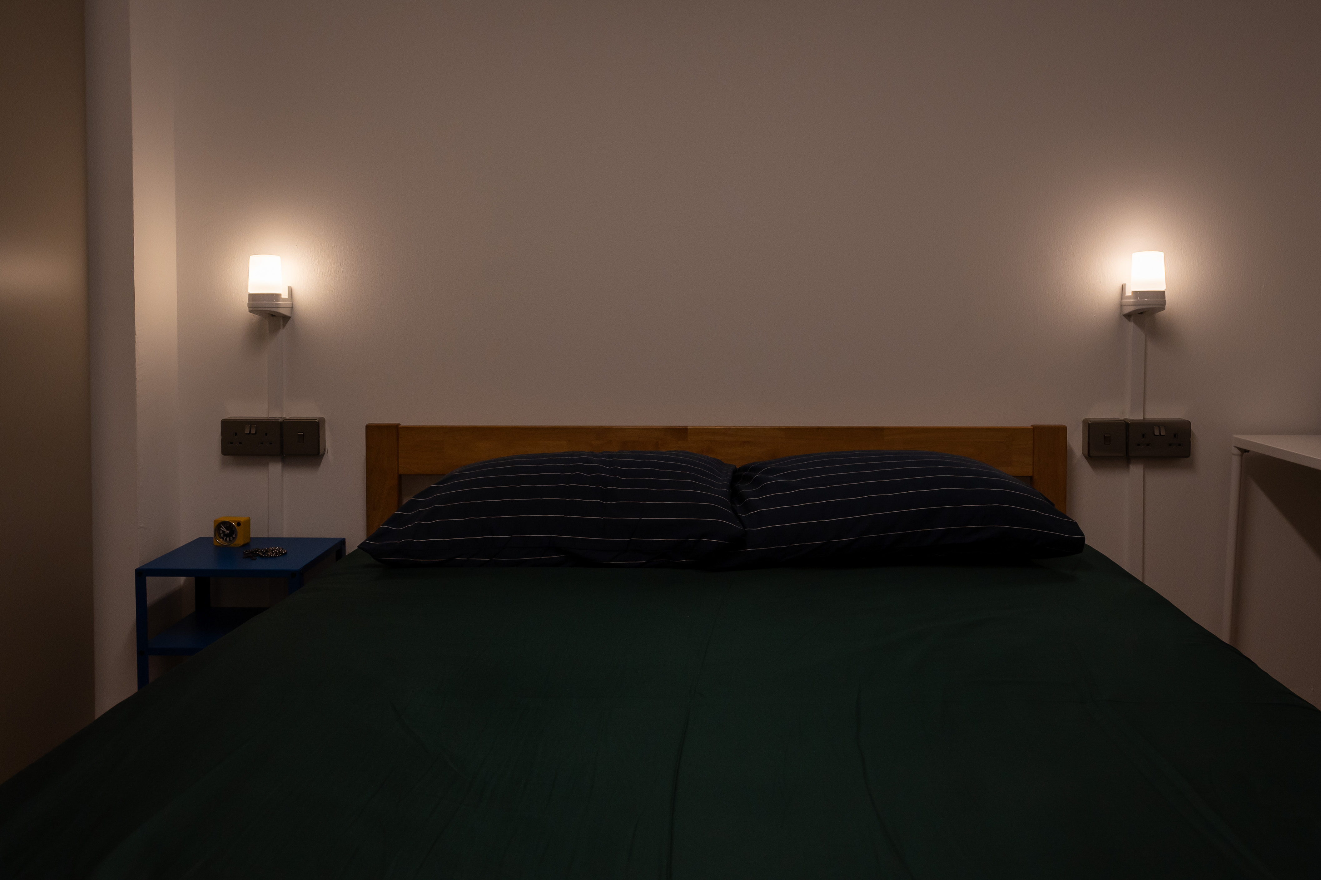 Using colour to spruce up a minimalist bedroom!