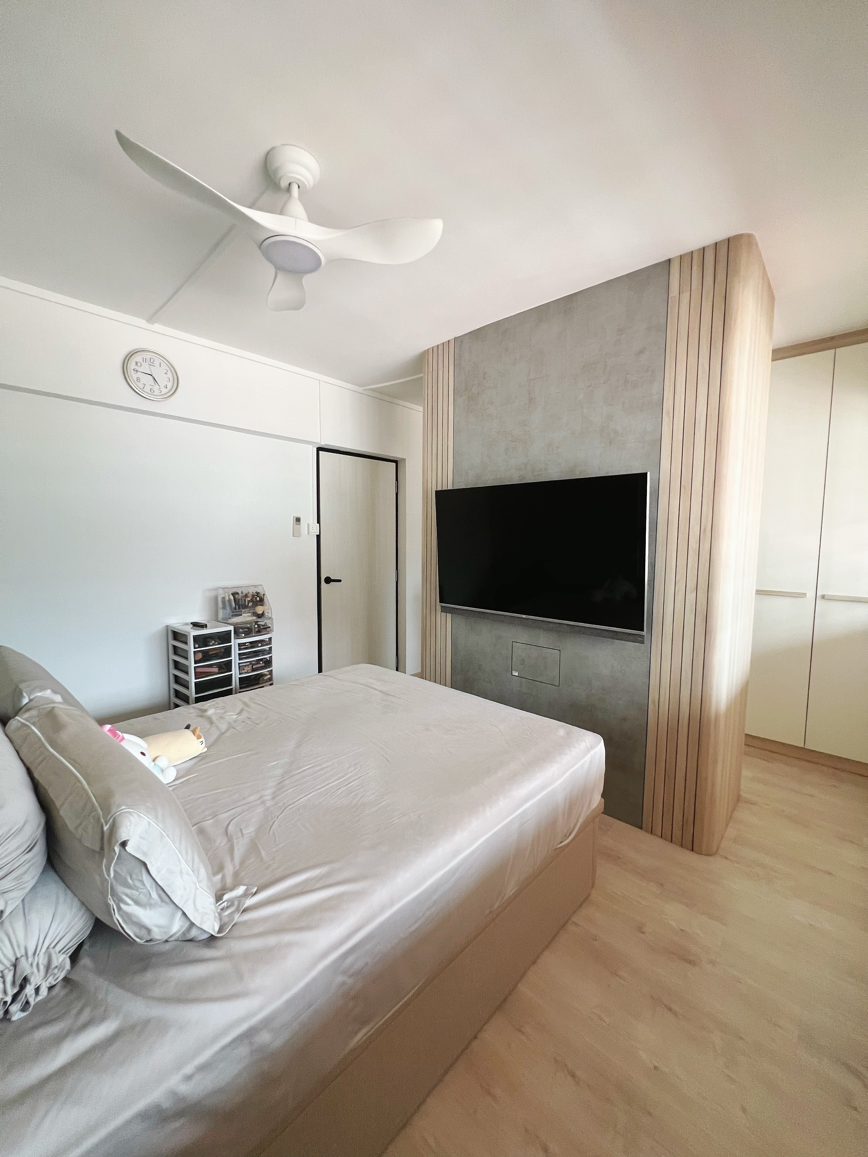 Cozy minimalist master bedroom with walk-in wardrobe