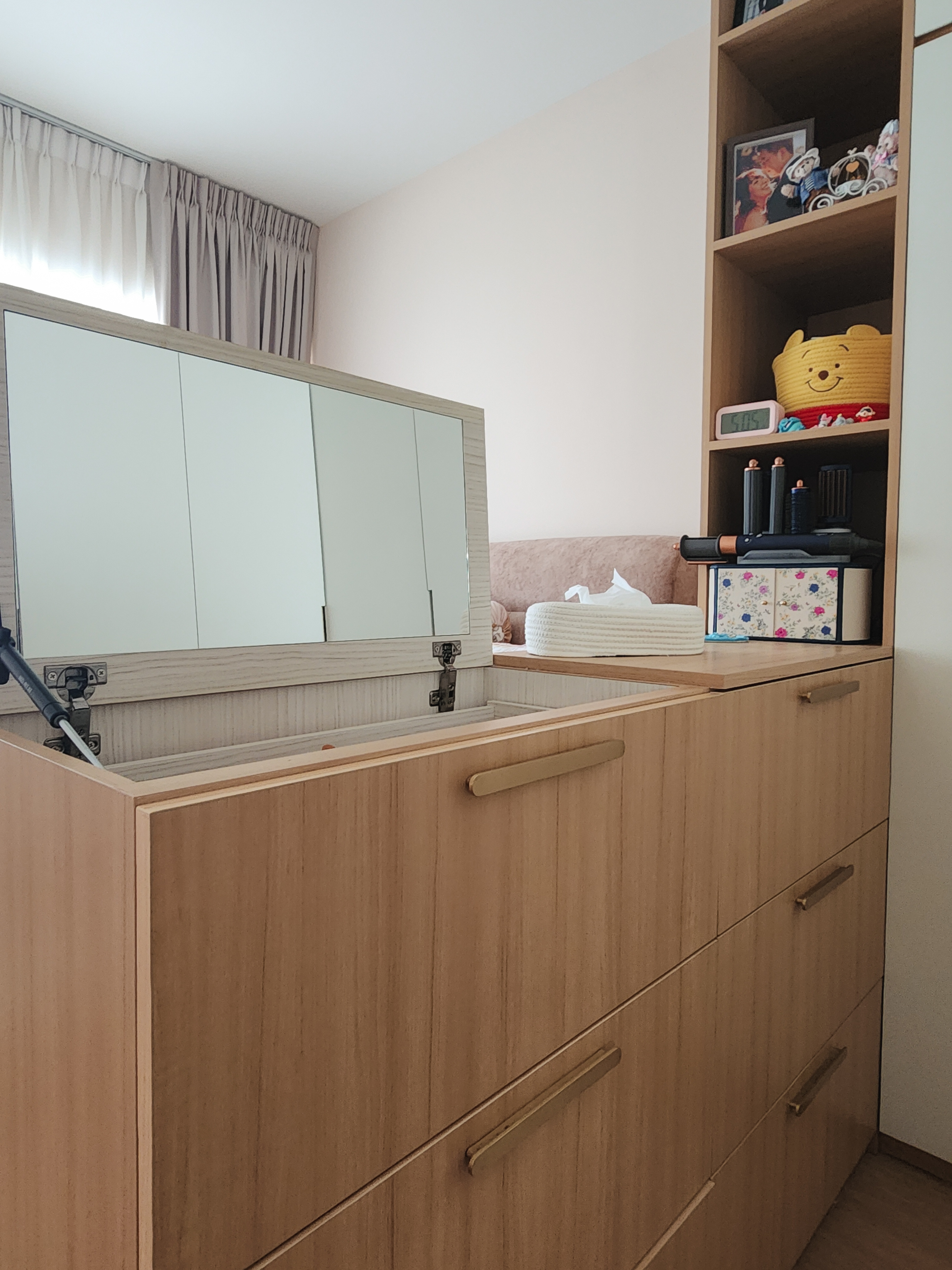 A hidden vanity in our semi walk-in wardrobe