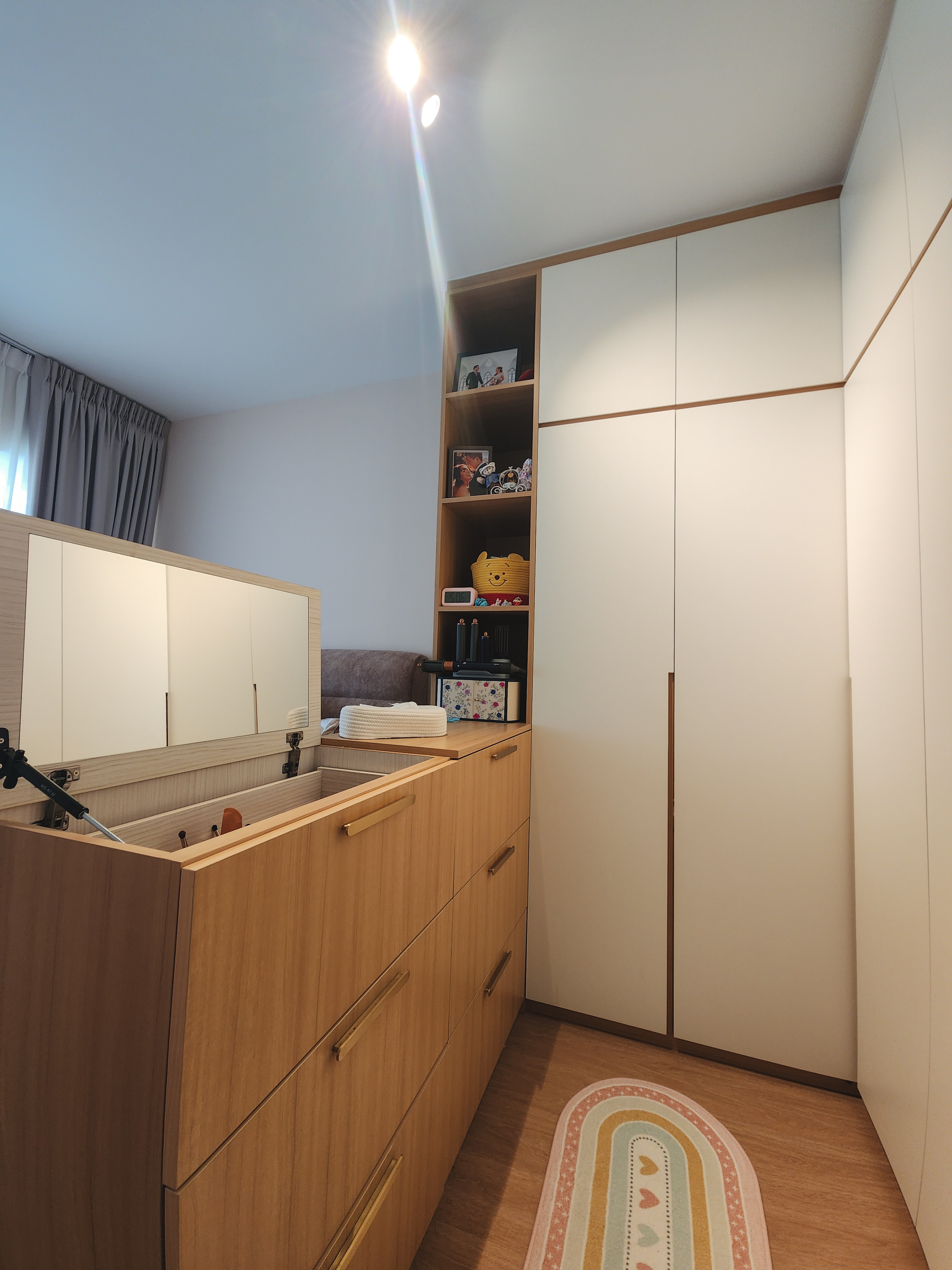 A hidden vanity in our semi walk-in wardrobe