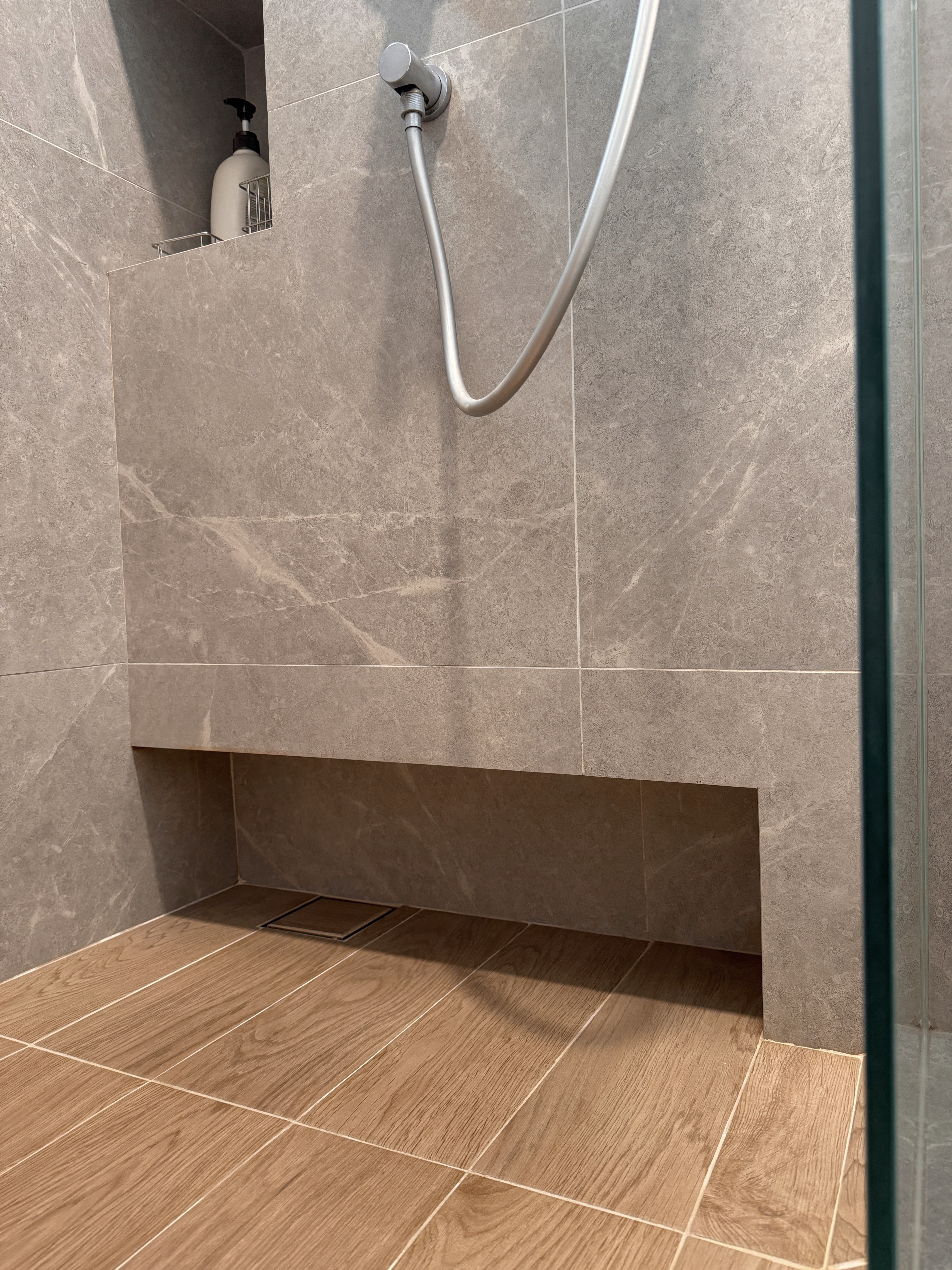 A Curved Glass Wall in Your Bathroom? See How We Made It Work!