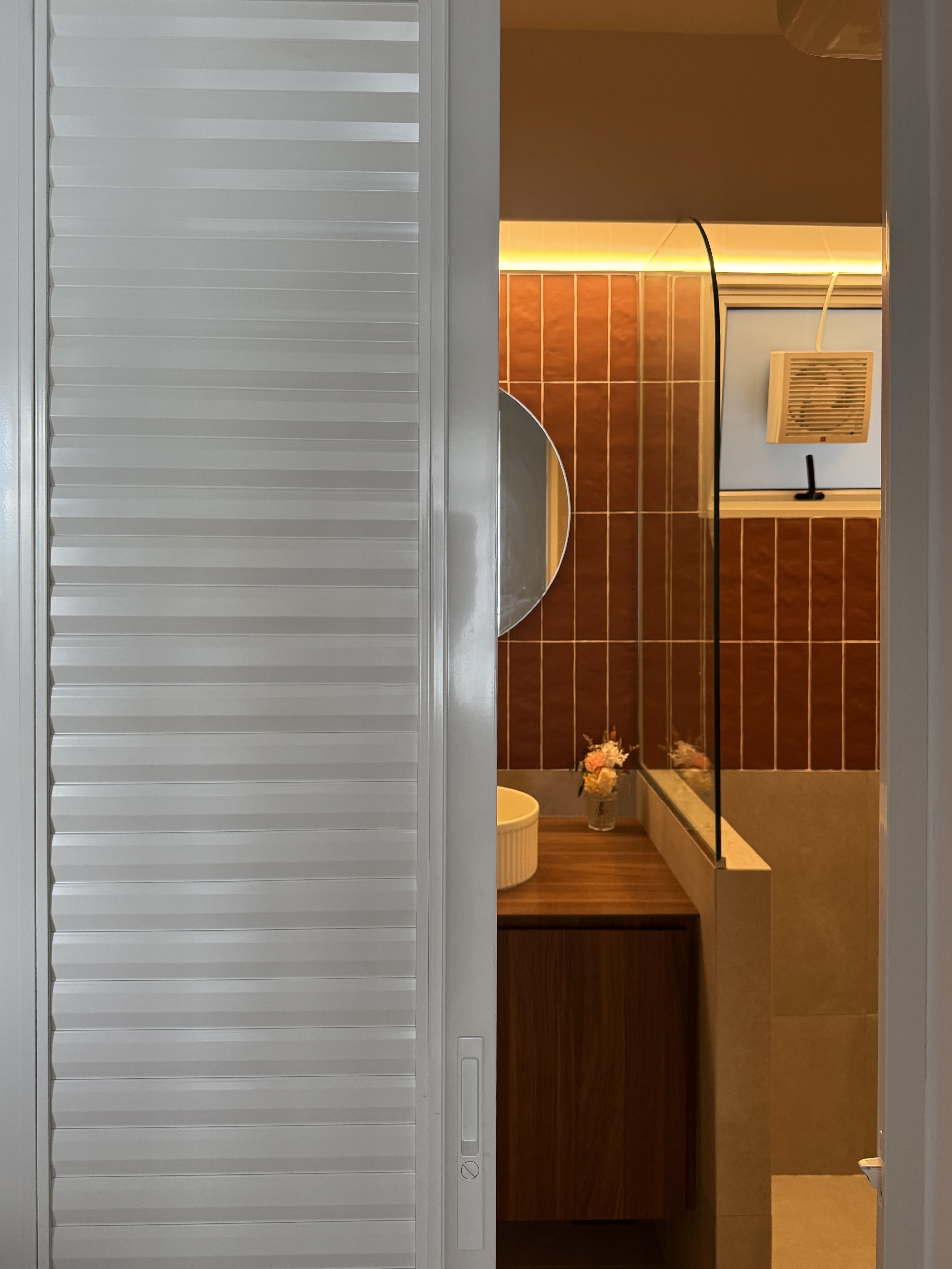 A Tale of Two Bathrooms: Terracotta Warmth and Olive Green Serenity