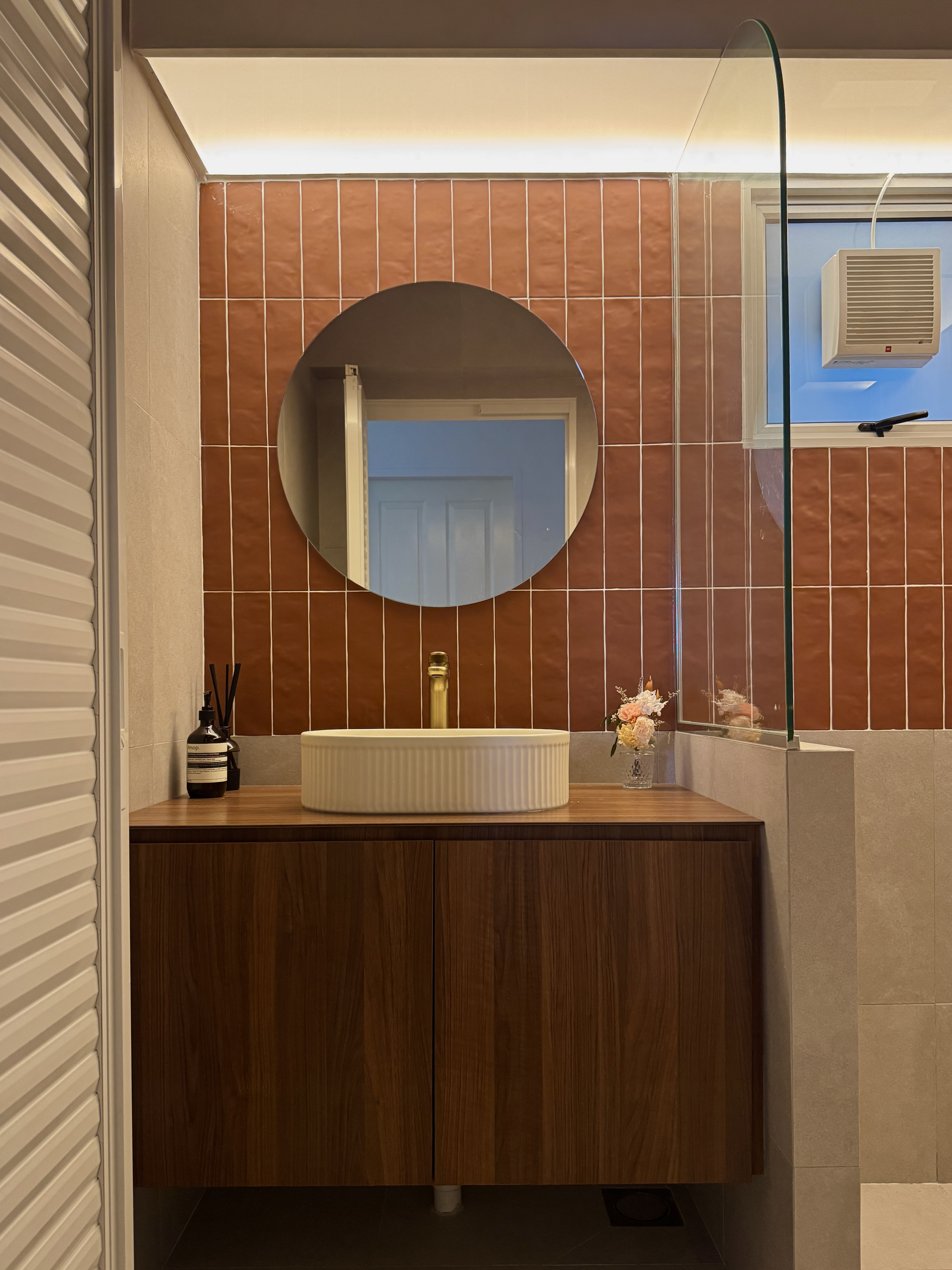 A Tale of Two Bathrooms: Terracotta Warmth and Olive Green Serenity