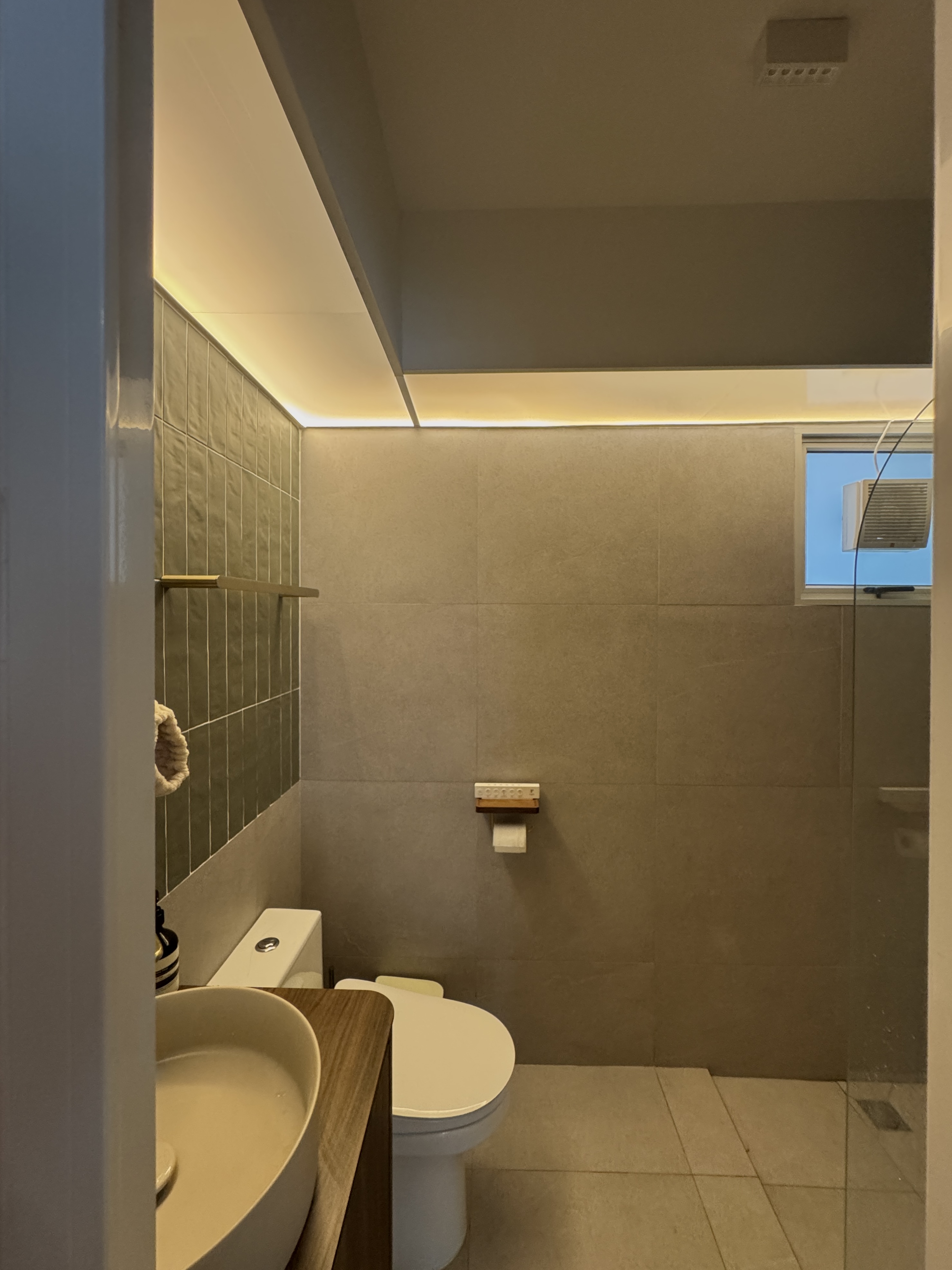 A Tale of Two Bathrooms: Terracotta Warmth and Olive Green Serenity