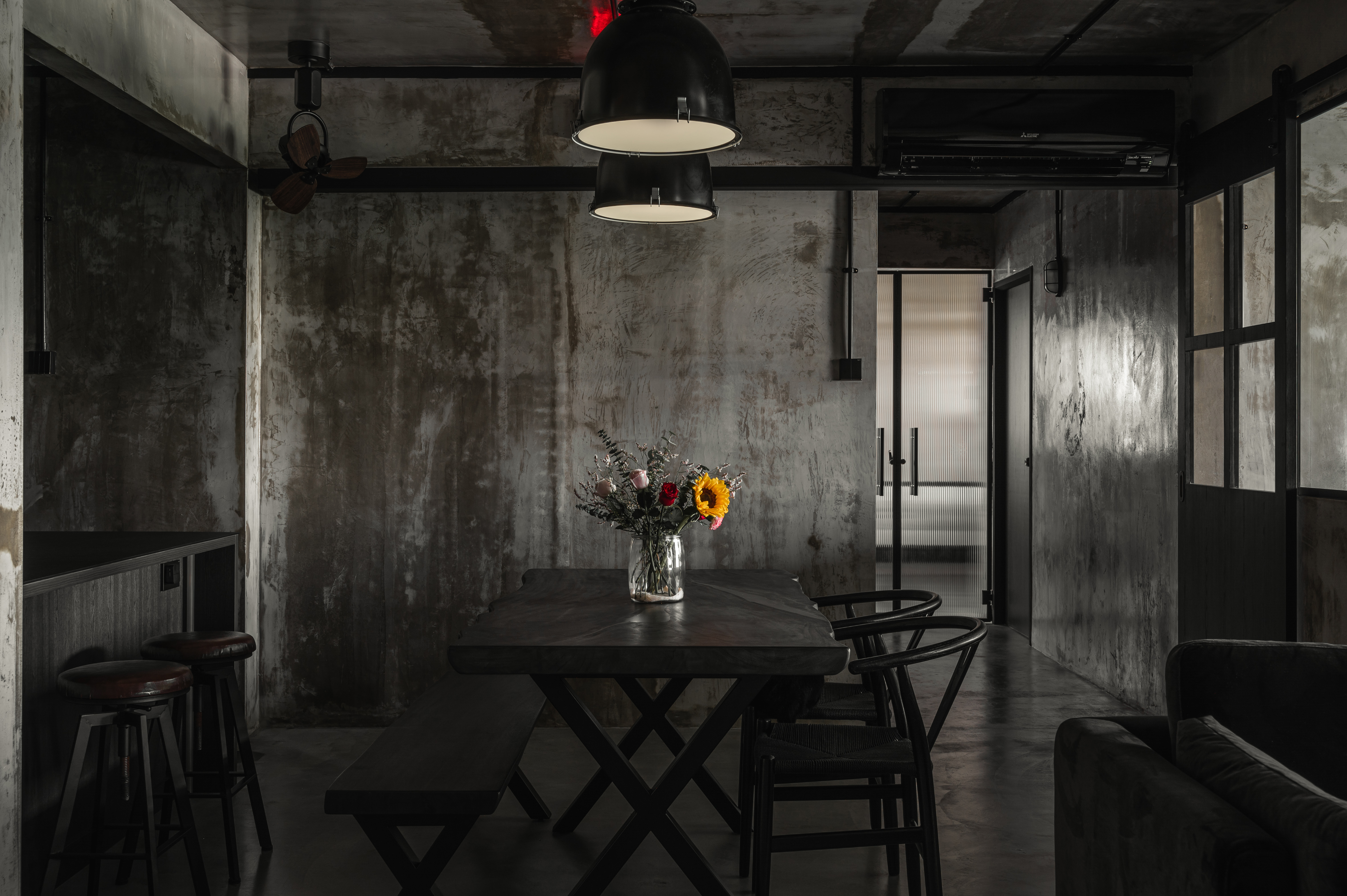 House Tour: Dark Hues Anchor This Modern Industrial Apartment