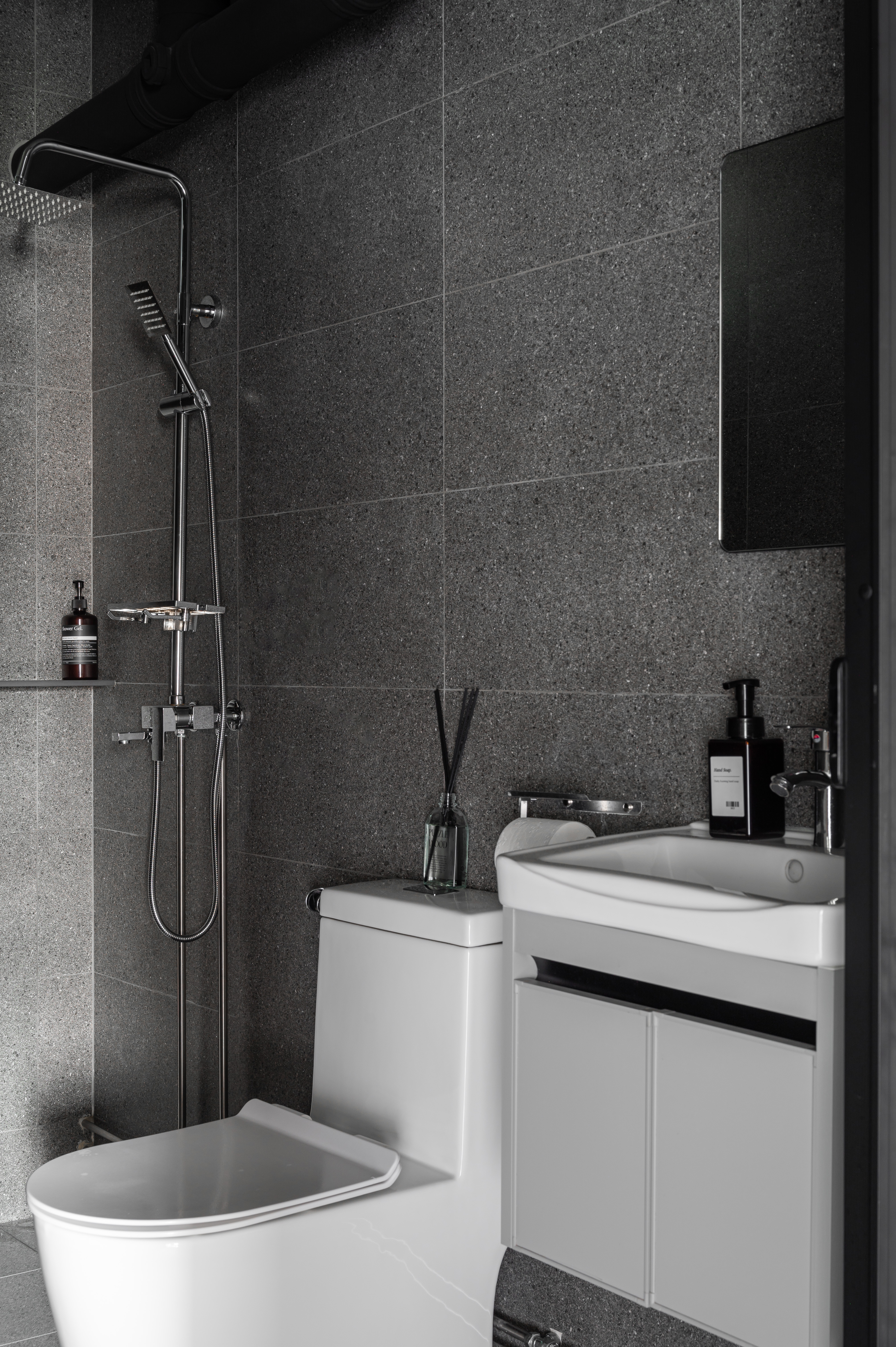 House Tour: Dark Hues Anchor This Modern Industrial Apartment