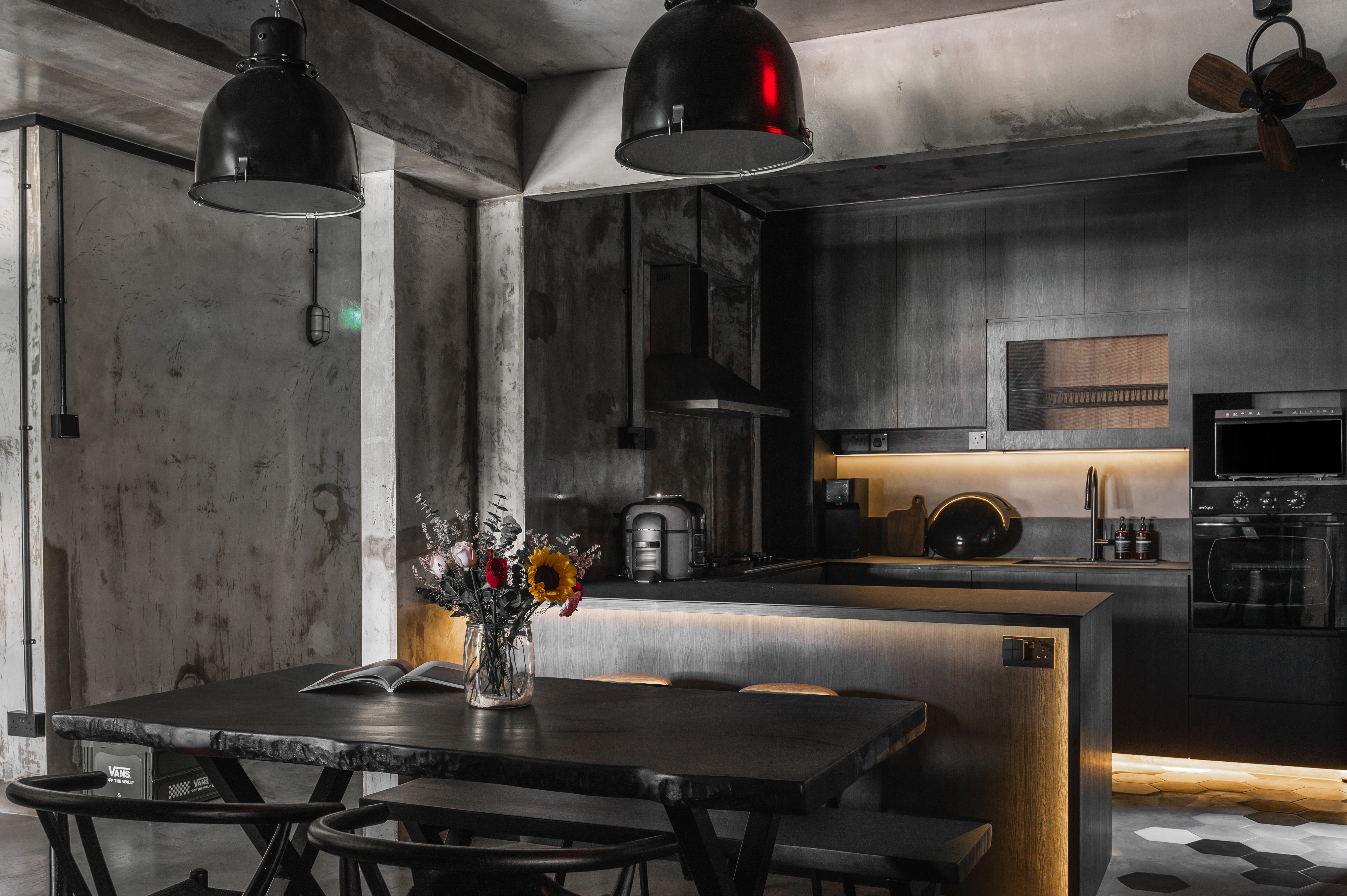 House Tour: Dark Hues Anchor This Modern Industrial Apartment